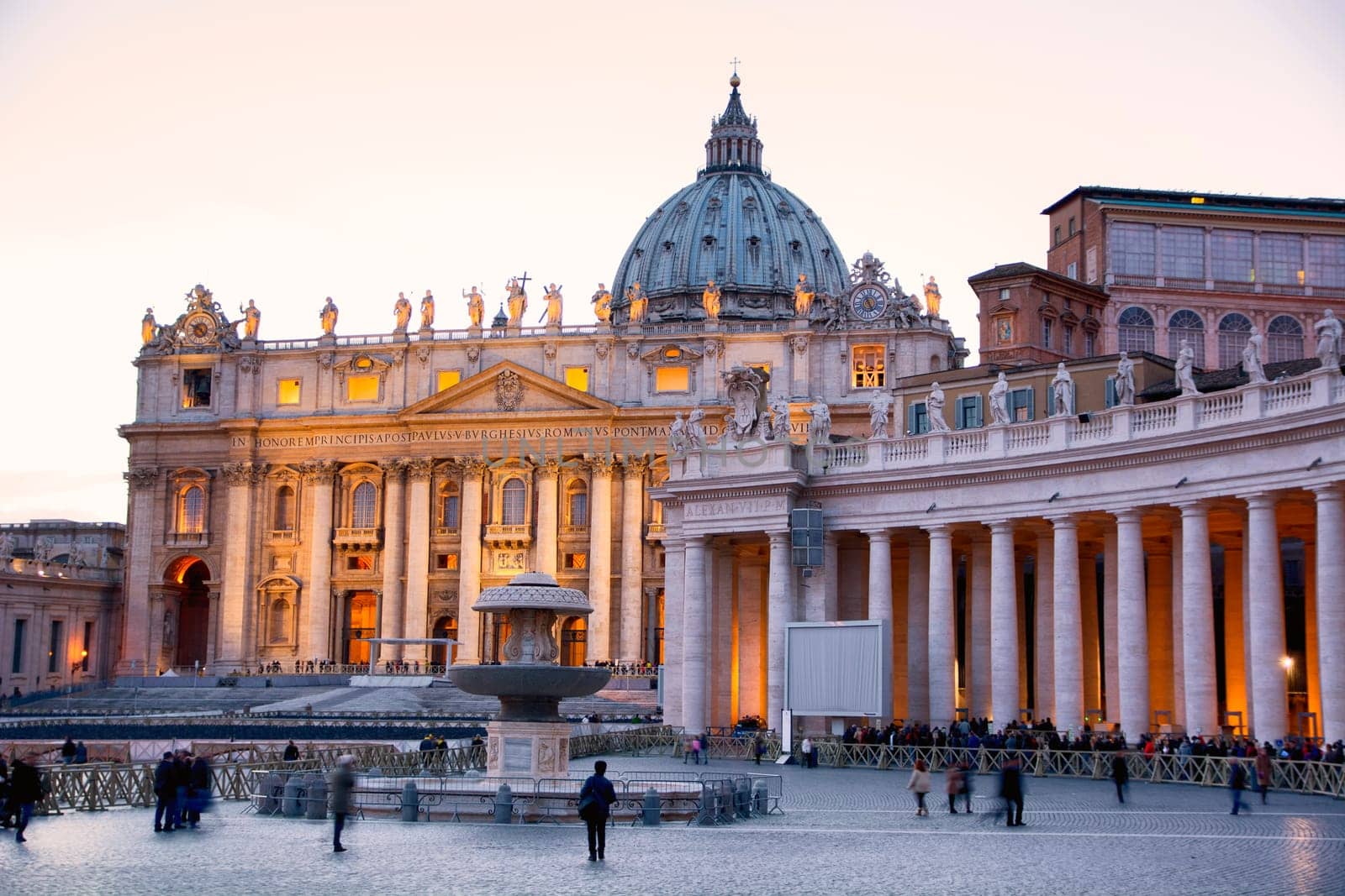 Saint Peter's Square in Vatican City (Rome, Italy) at dusk