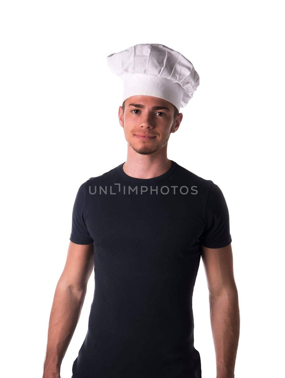 Half Body Portrait of Young Male Chef Wearing Casual Black Shirt and White Hat While Looking at the Camera. Isolated on White Background.