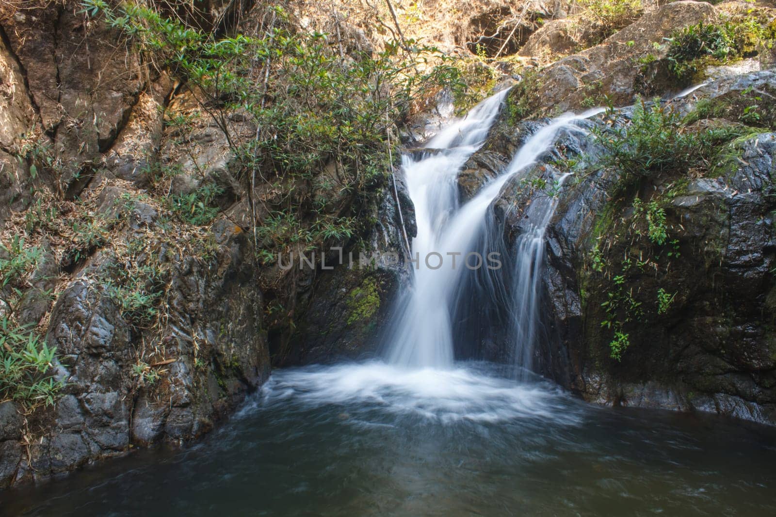 Thor Thip waterfall in thai national park.waterfall in the deep forest on mountain