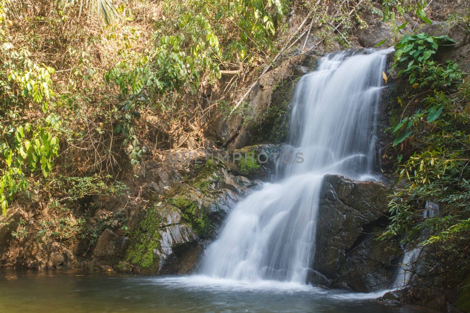 Thor Thip waterfall in thai national park.waterfall in the deep forest on mountain