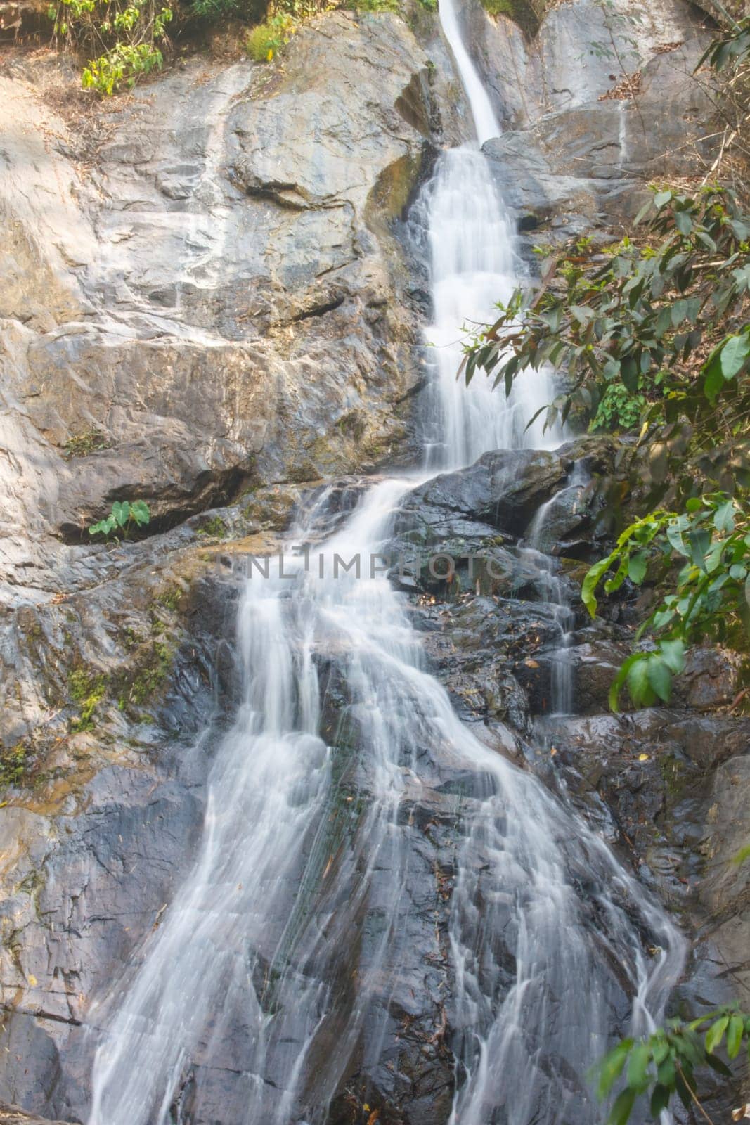 Thor Thip waterfall in thai national park.waterfall in the deep forest on mountain
