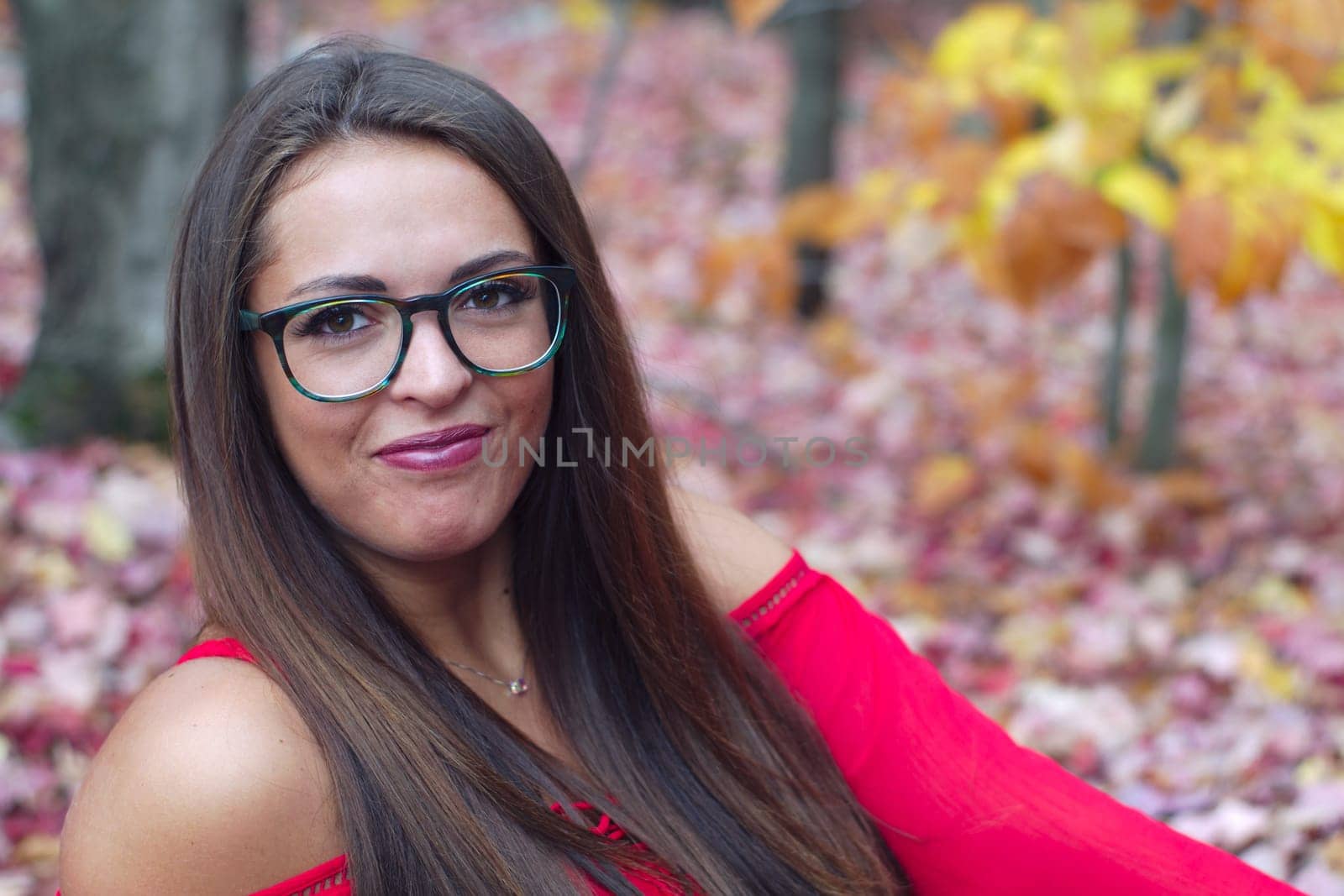 eyeglasses woman autumn attractive portrait outdoor orange fall colors