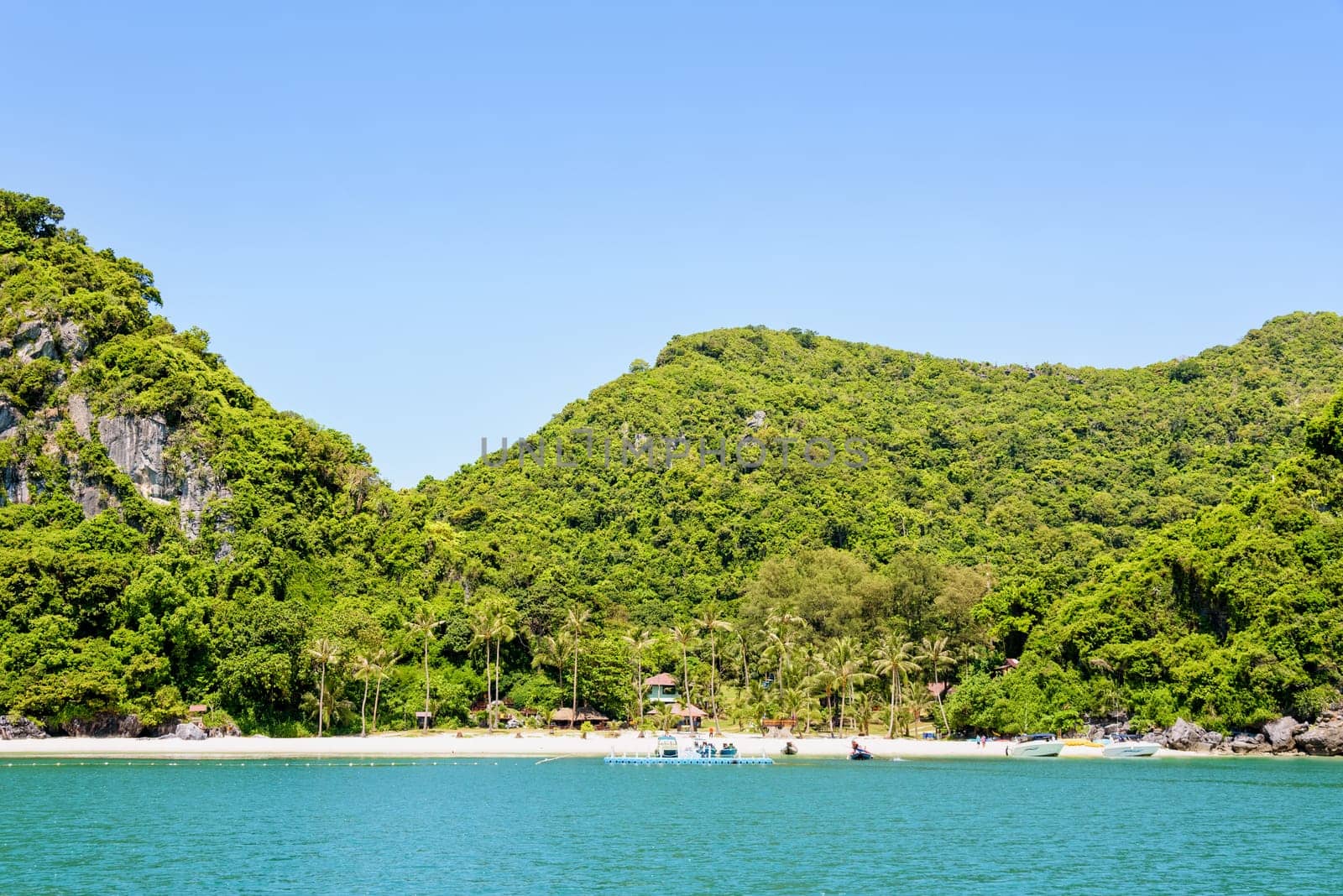 Beautiful natural landscapes of the island, beach and sea during summer at the floating pier front of the Ko Wua Talap island in Mu Ko Ang Thong National Marine Park, Surat Thani province, Thailand