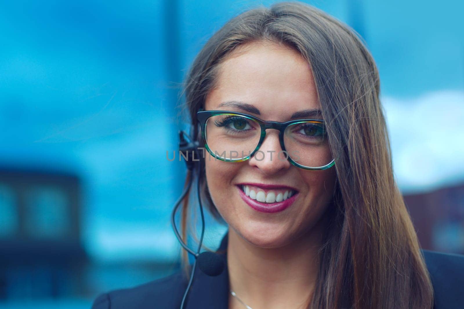 young woman representative talking in a phone microphone for customer support