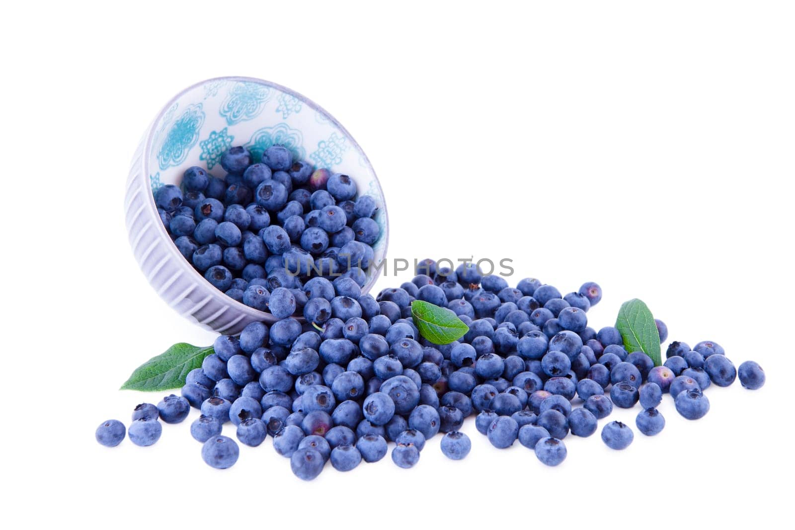blueberry fruits with porcelain bowl isolated on white