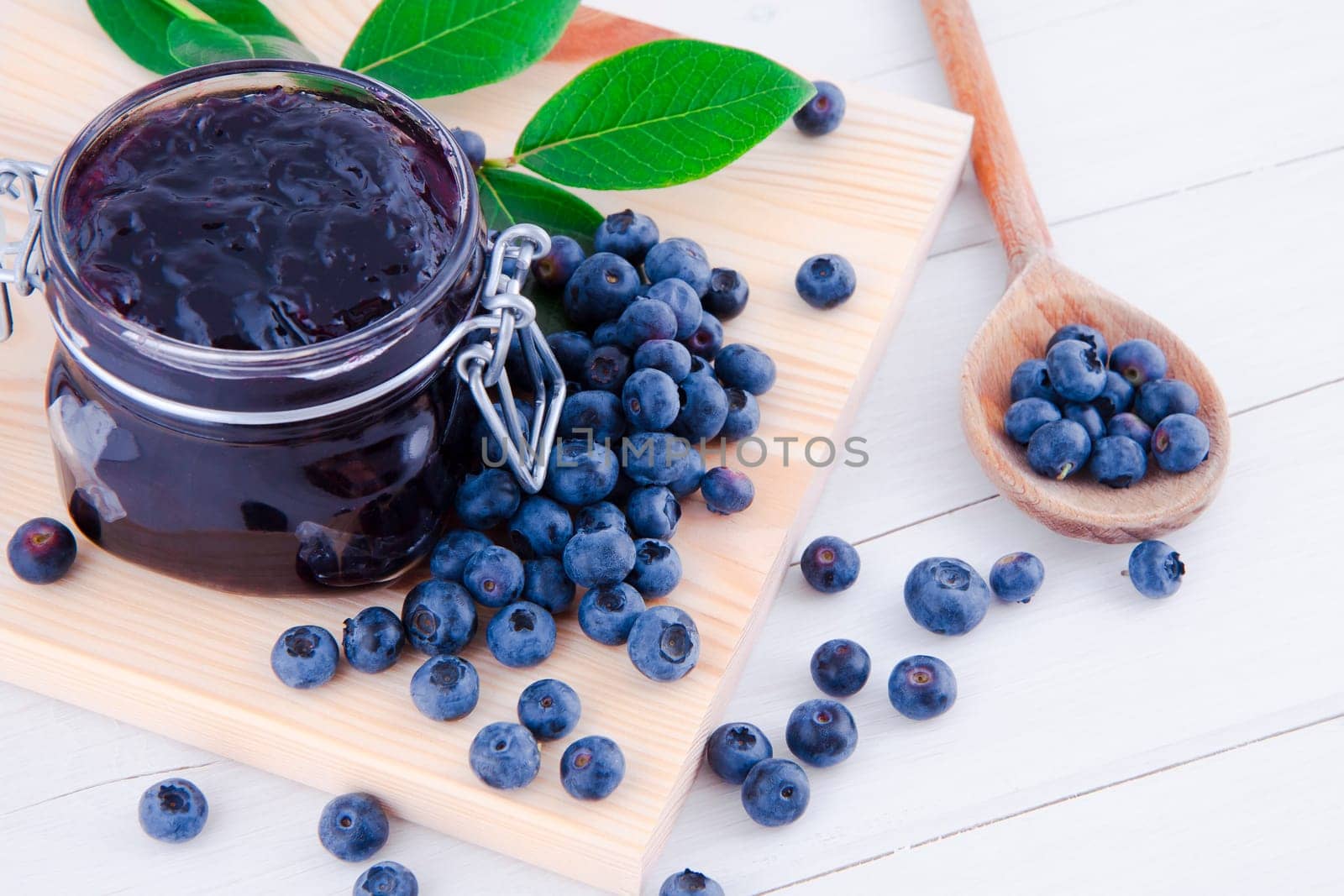 blueberry fruit jam in the kitchen on the white table