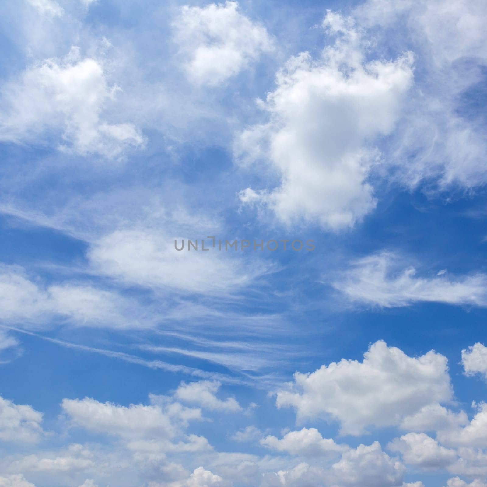 Wonderful blue sky with abstract powerful clouds