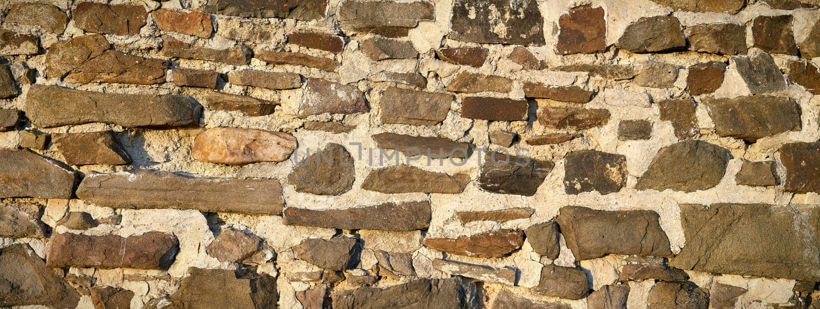 old historic wall made of natural stone