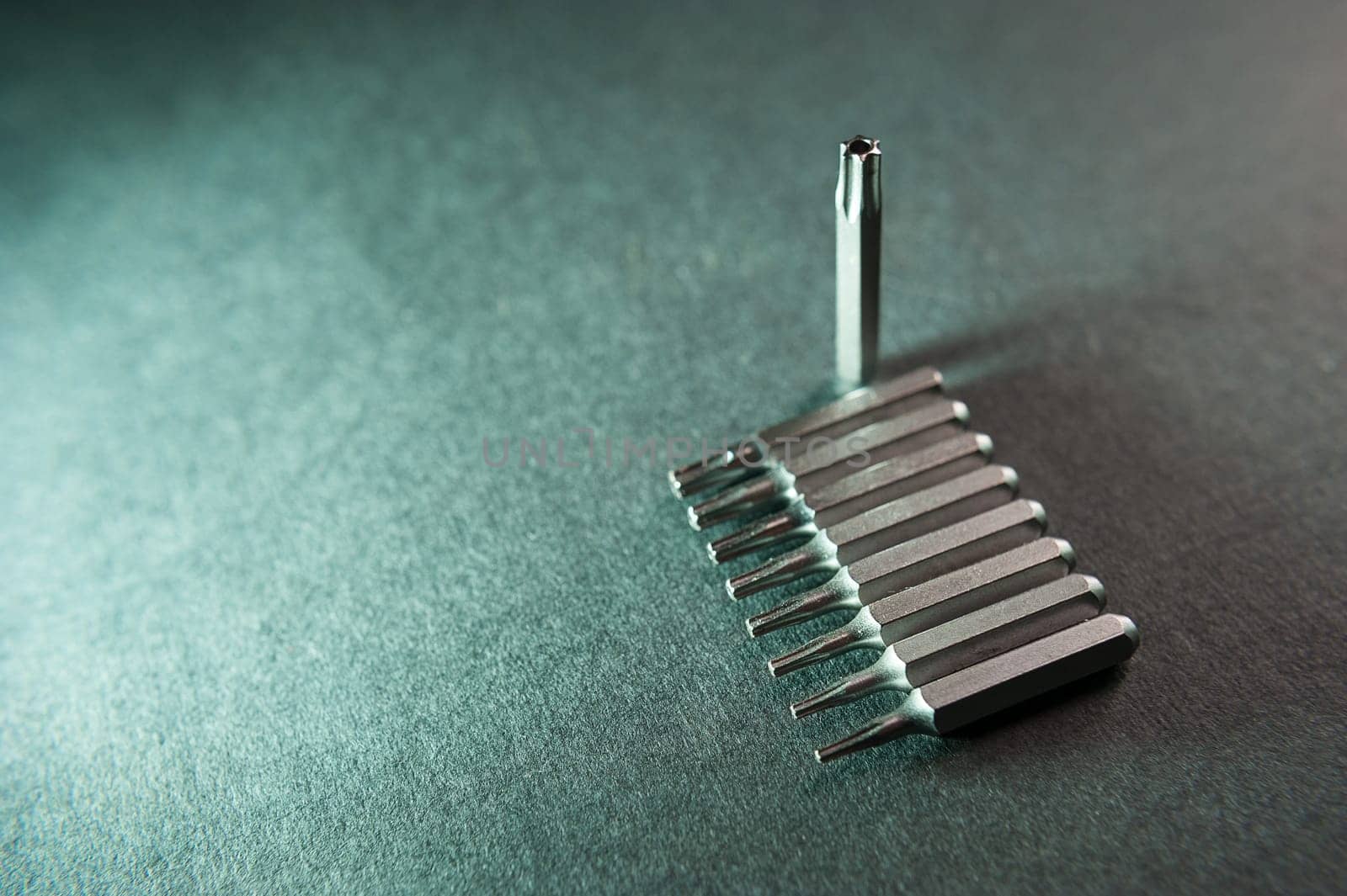 replaceable tips for screwdrivers, different sizes, nine in a row, a torx