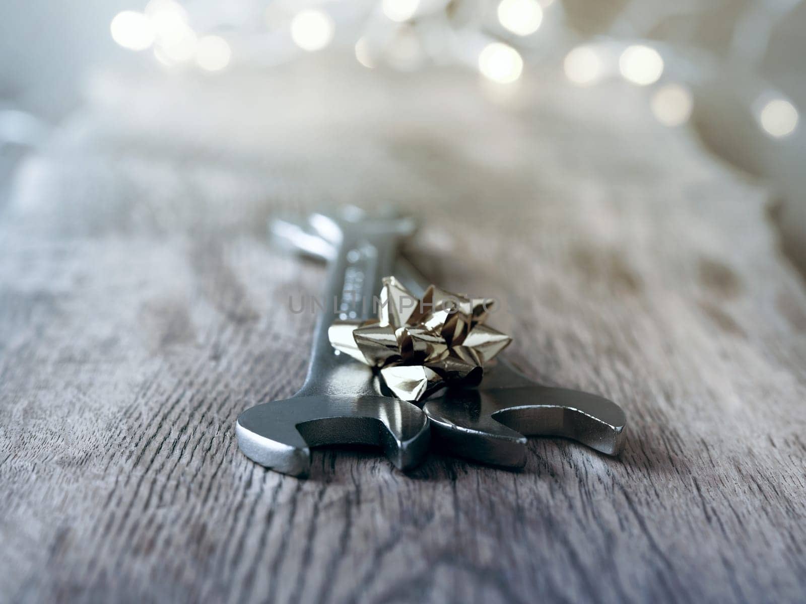 Christmas background with industrial tools on a rustic wooden table