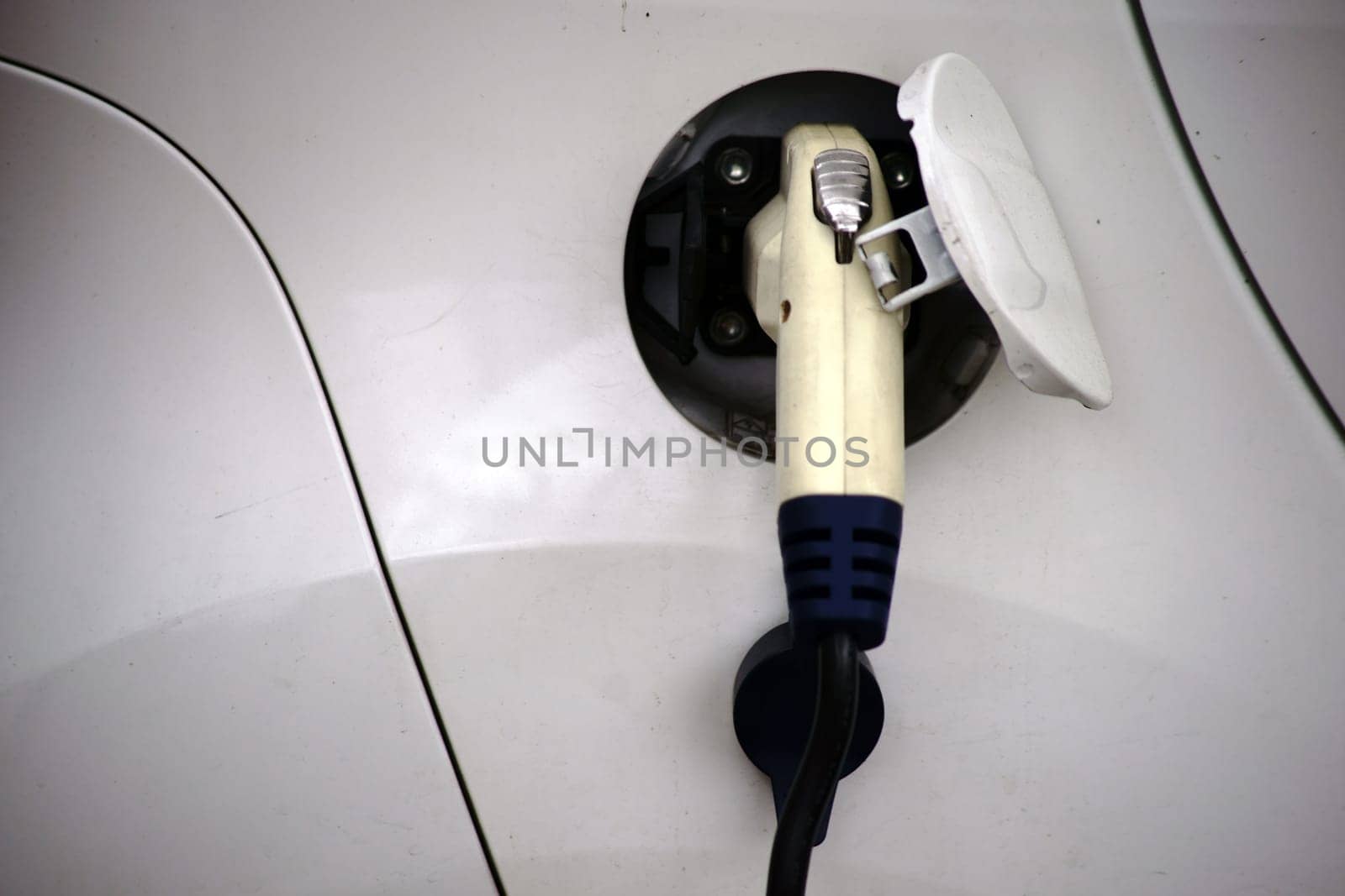 A filling station for cars with electric drive with an electric connection.