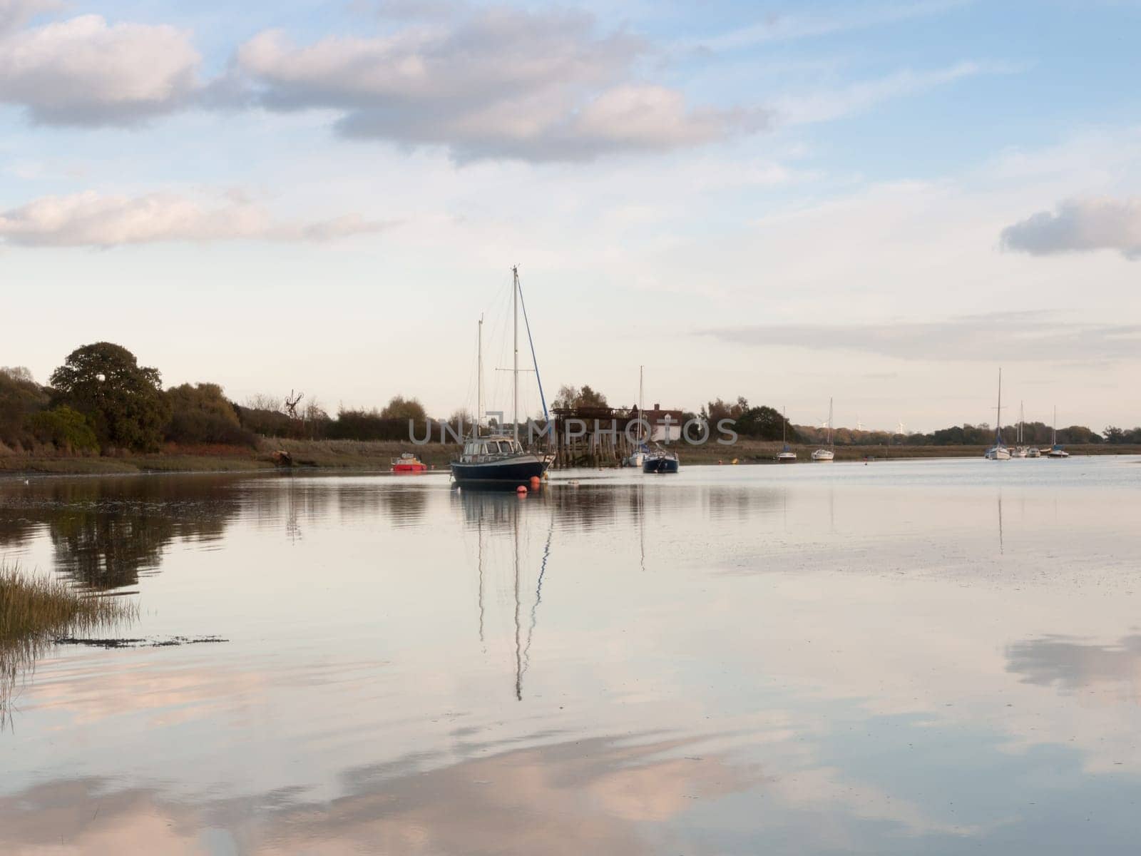 boats in harbour masts landscape river lake water surface clear  essex  england  uk