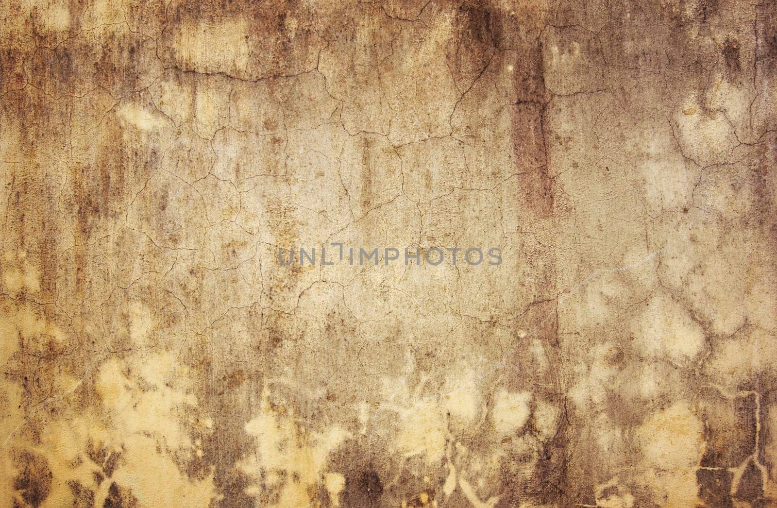 Old cracked plaster in grunge style useful like background - vintage texture
