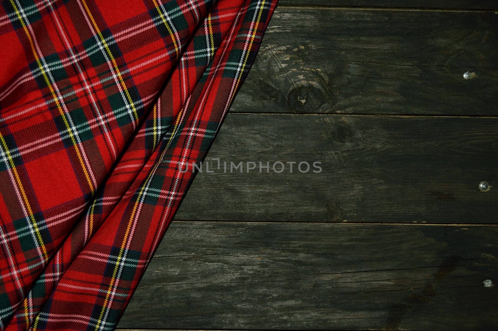 checkered fabric on wood background