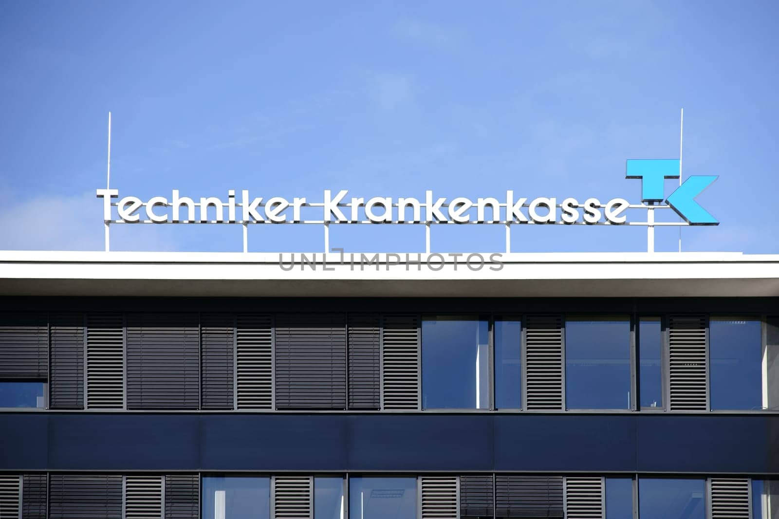 Darmstadt,Germany - October 31,2017: The façade of the modern office building of Techniker Krankenkasse TK with logo and office windows on October 31,2017 in Darmstadt.