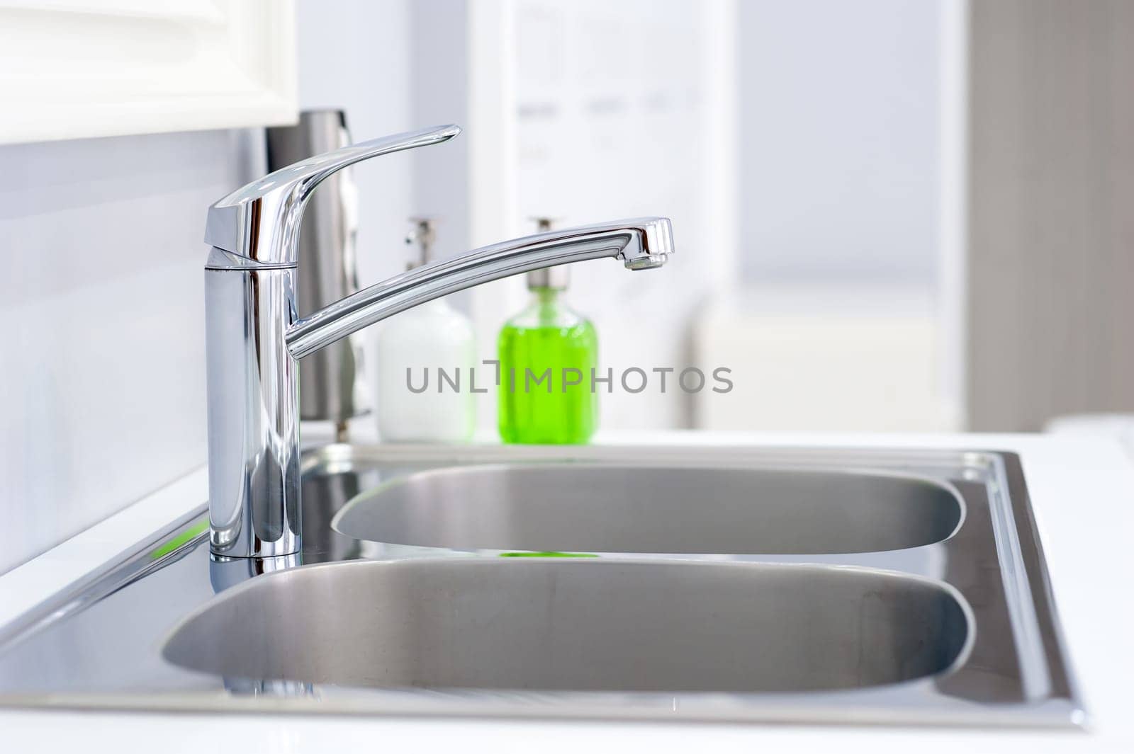 Interior of bathroom with sink basin faucet. Modern design of bathroom.