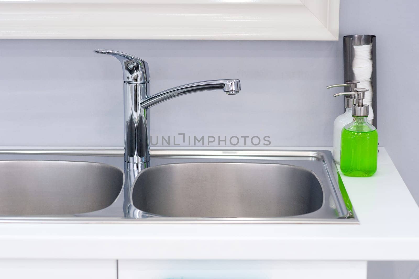 Interior of bathroom with sink basin faucet. Modern design of bathroom.
