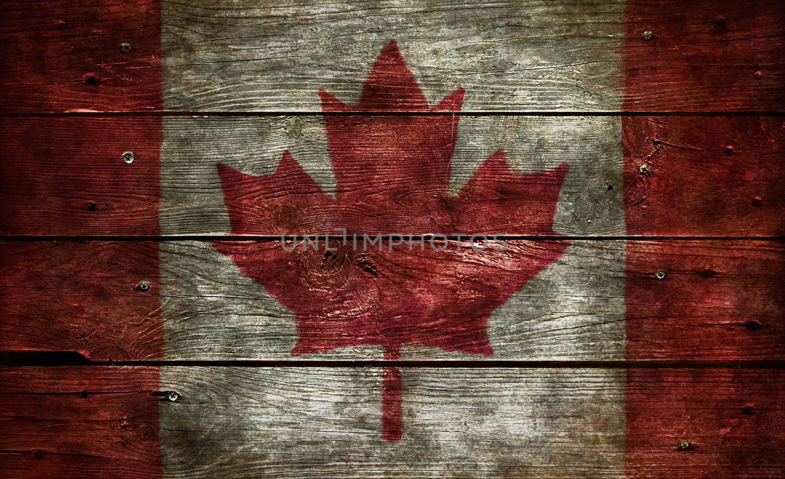 flag of canada on old wooden boards