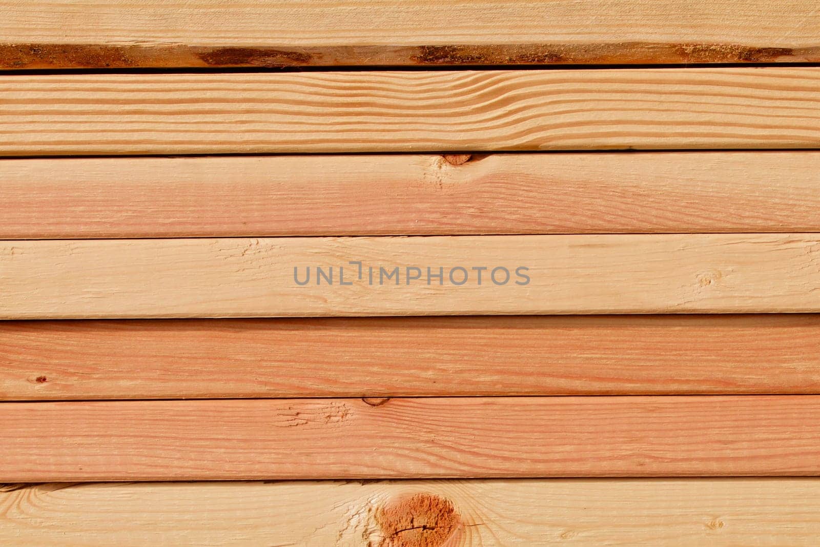 Stacked pine planks on side