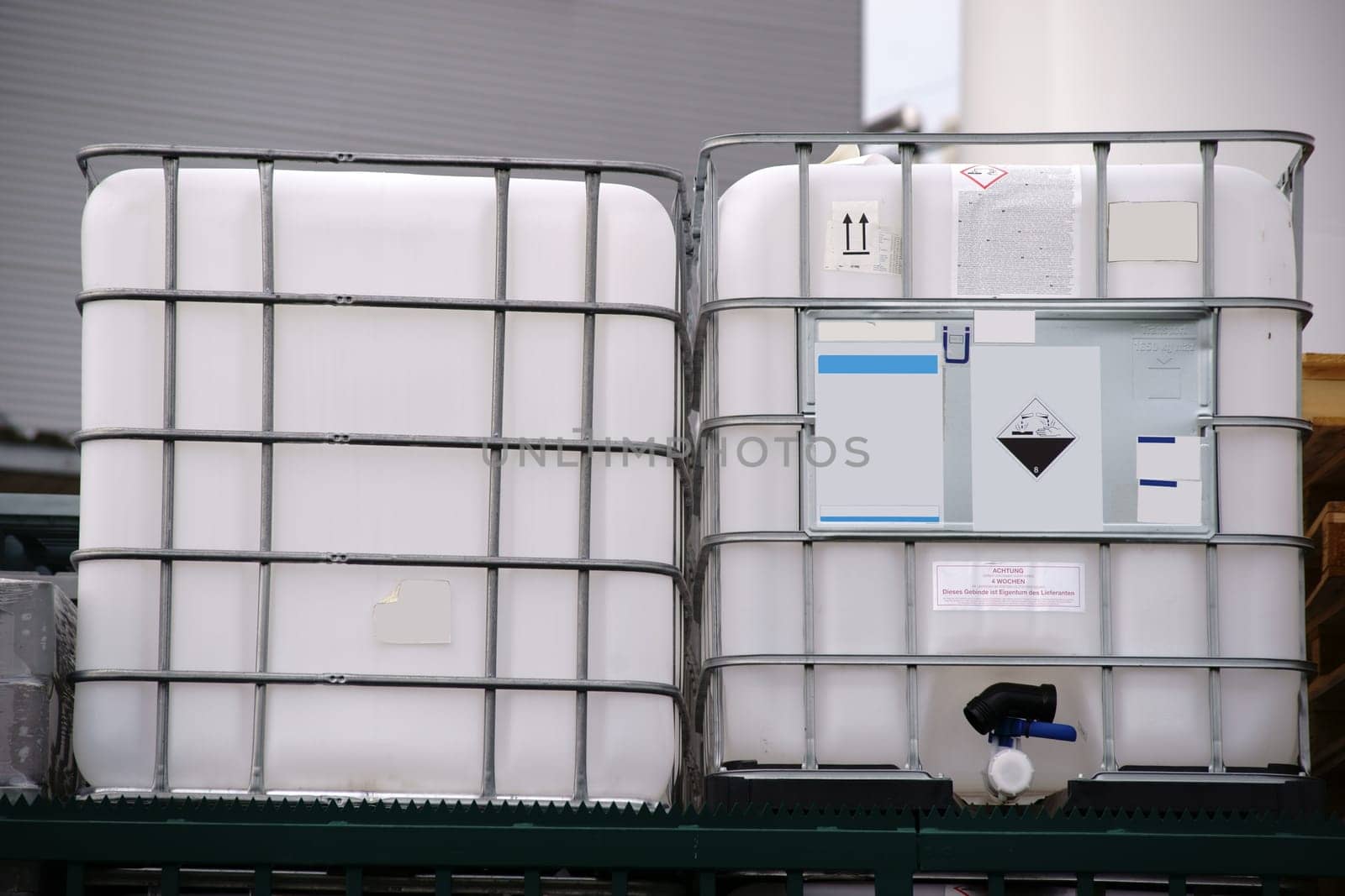 Large acid-resistant plastic containers for transporting corrosive and acidic chemicals.