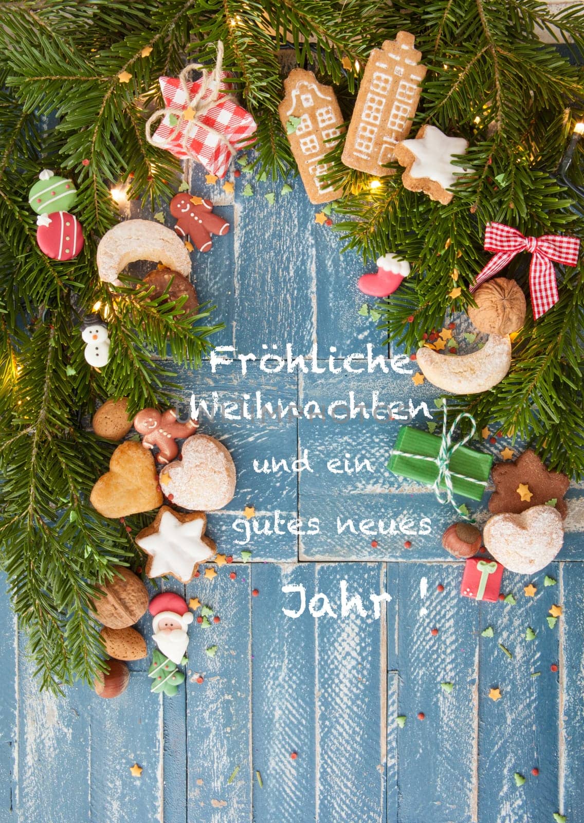 Places and nuesses in front of fir branches at Christmas