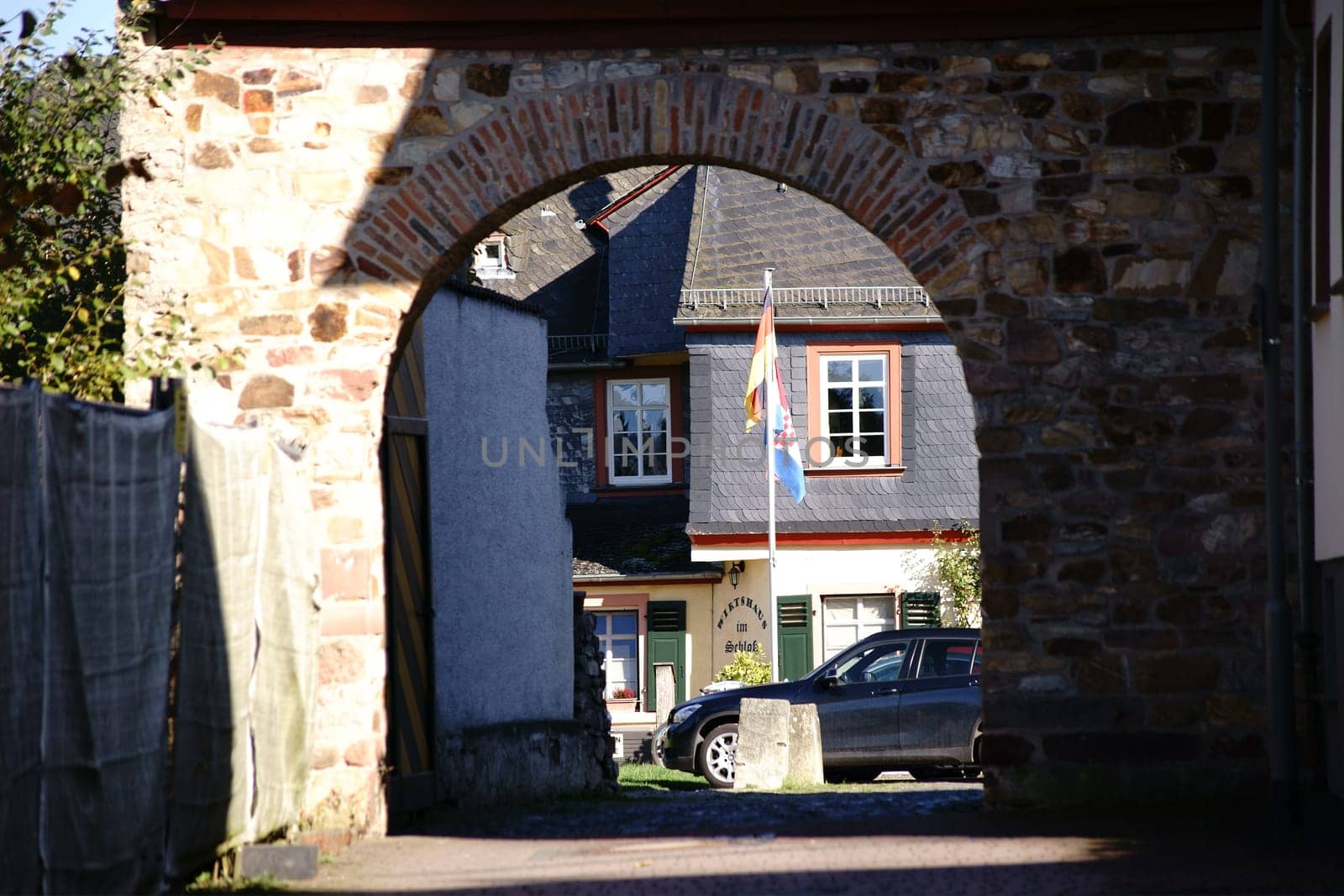 Taunusstein-Wehen,Germany - October 15,2017: The gate entrance of Wehen Castle with a round arch and field stones on October 15,2017 in Taunusstein-Wehen.