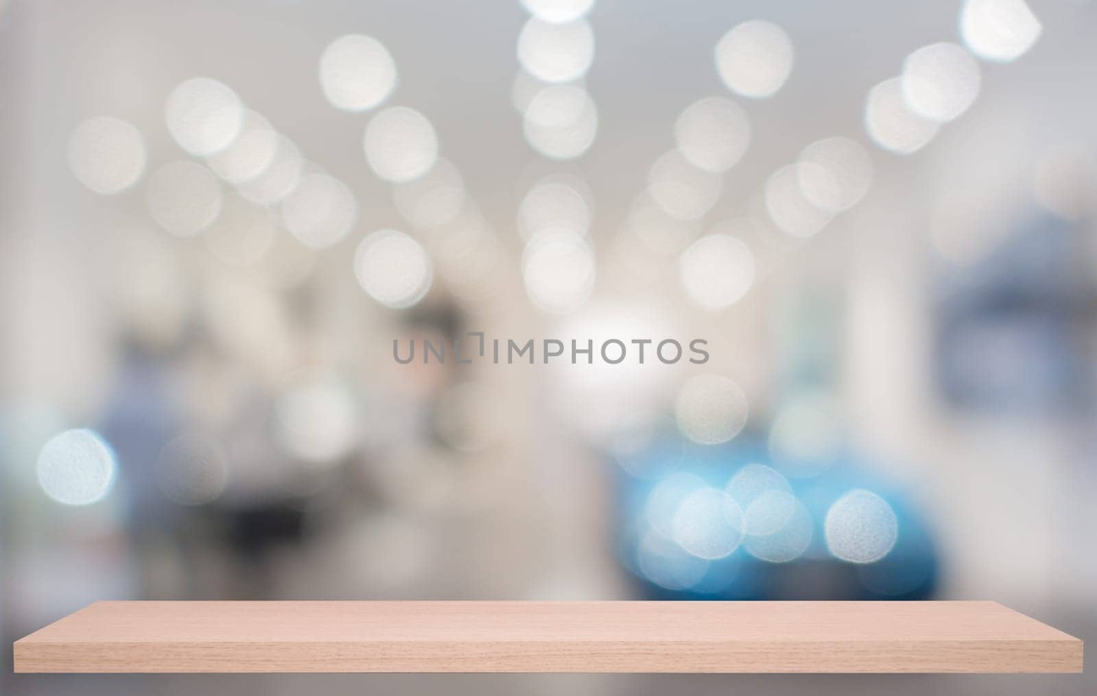 defocused image of Commercial car stand in show room with wooden shelf
