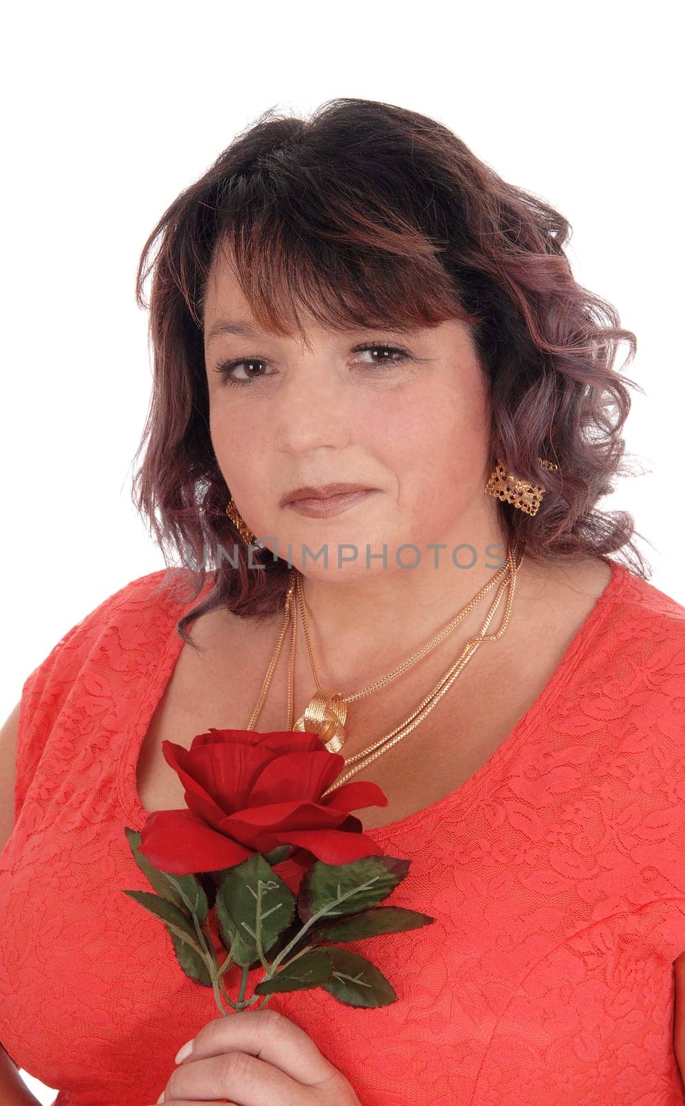 A closeup image of an plus size woman in a red dress holding a red.rose, with necklace, isolated for white background.
