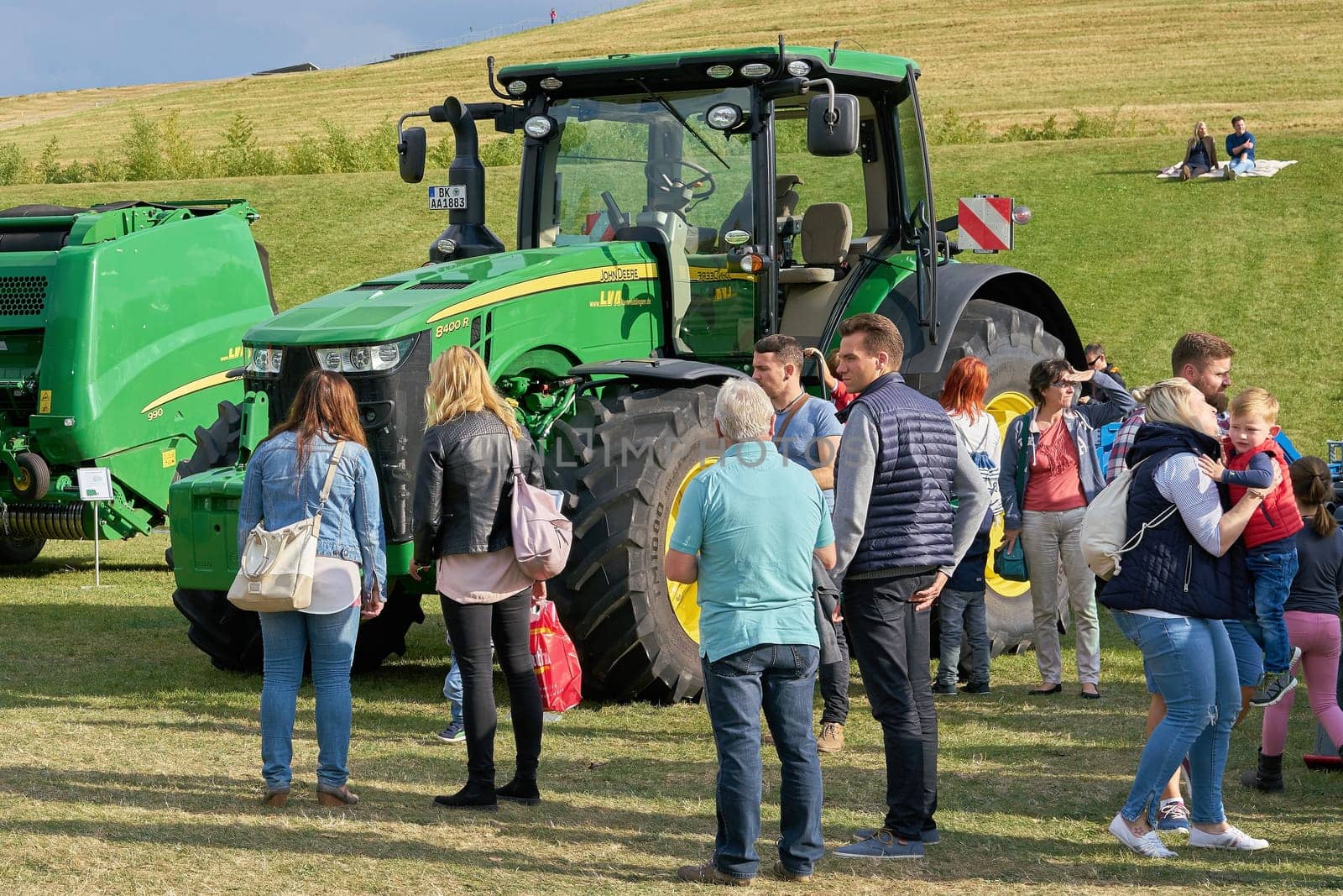 Visitors of the harvest festival in the Elbauenpark in Magdeburg during the presentation of new agricultural machinery