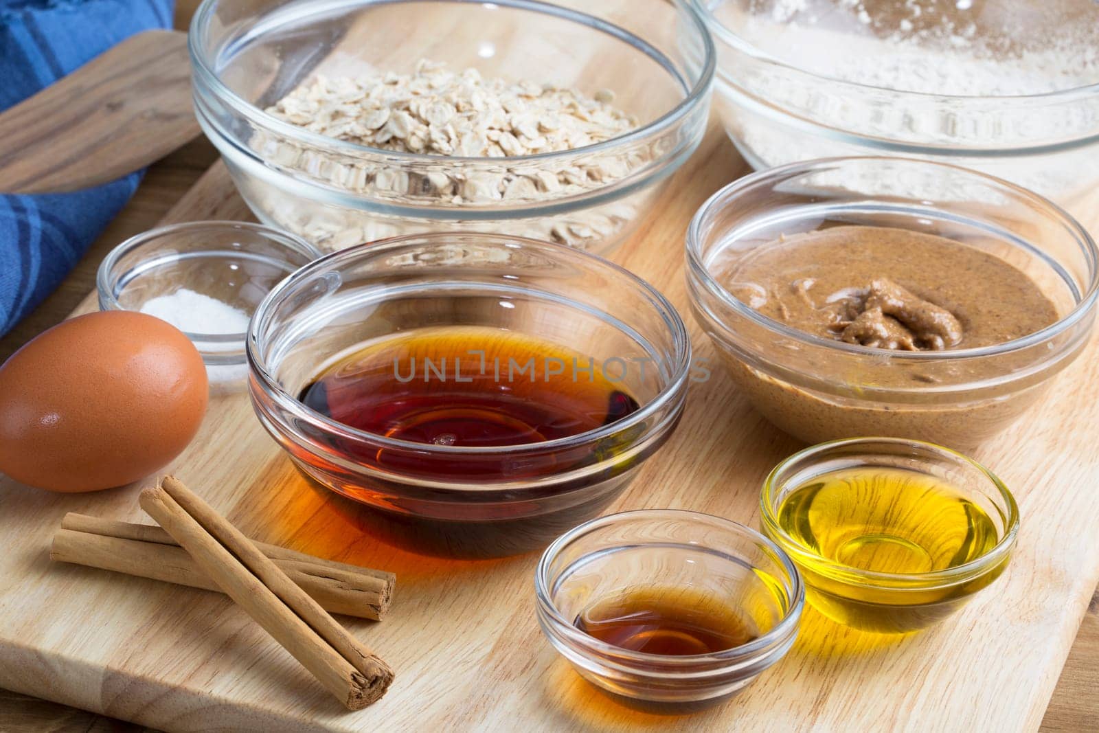 Dry and liquid ingredients for baking including an egg and cinnamon sticks