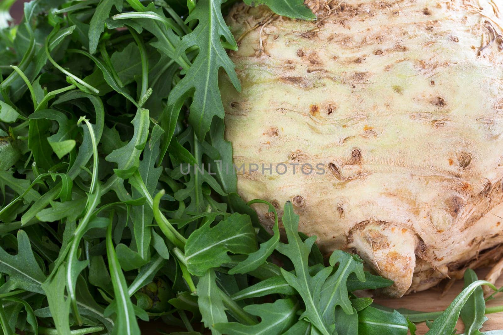 Celeriac and Arugula lettuce ingredients for a healthy salad