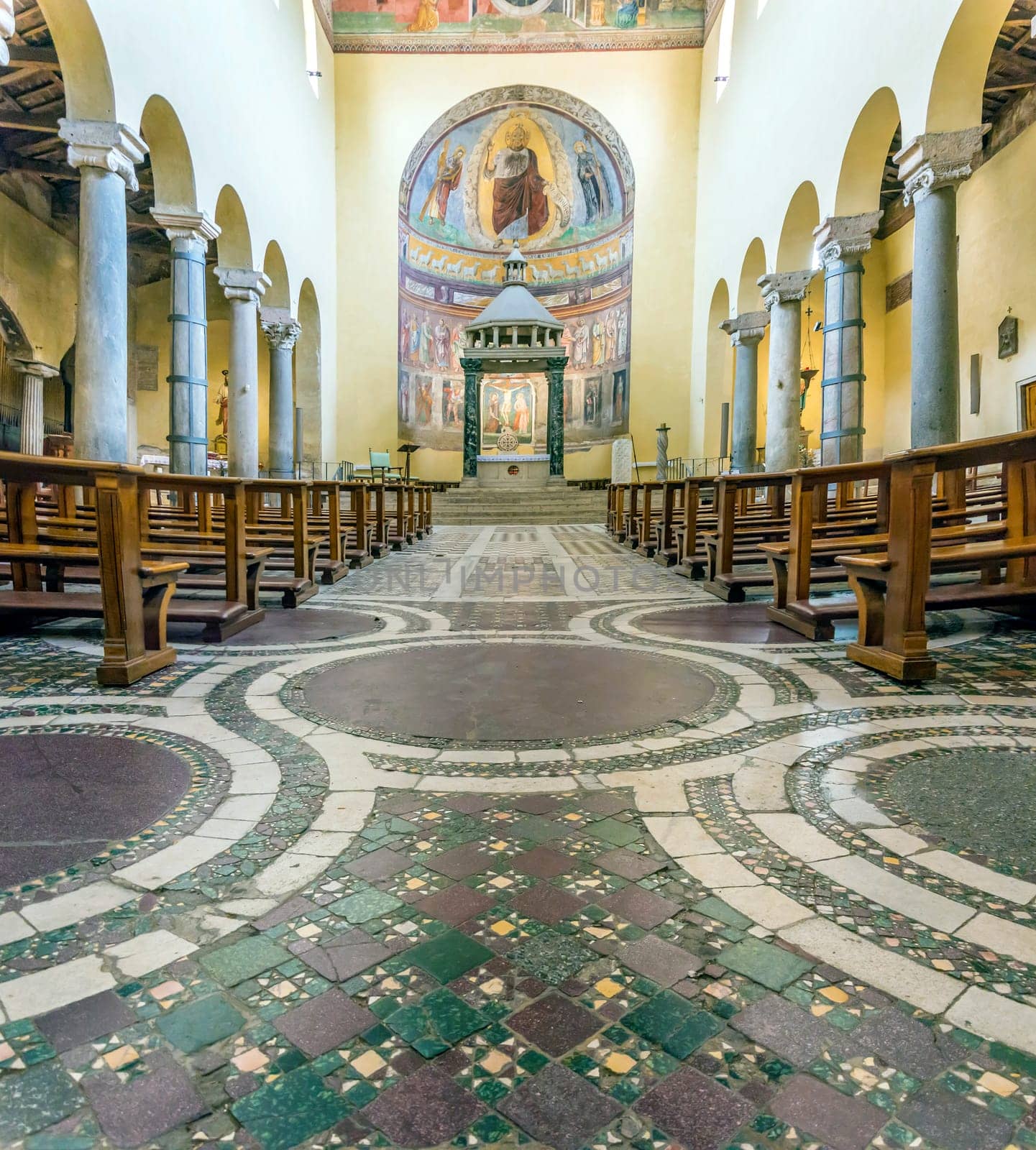 Rome, Italy, march 24, 2017: Interior with the central nave, the main altar and the decorated pavement of the ancient basilica church of San Saba in Rome.