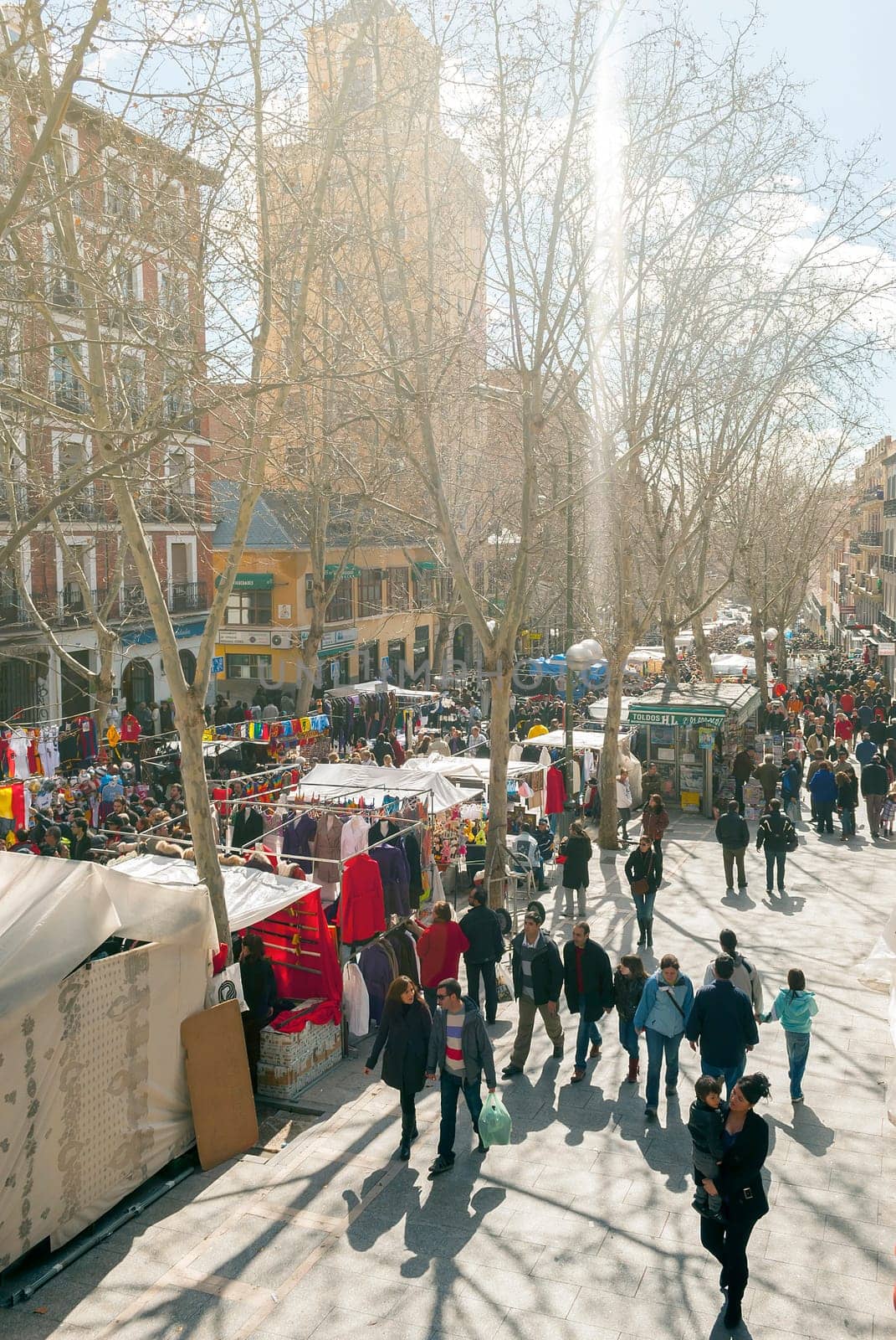 Madrid, Spain, february 28, 2010: Scene from El Rastro flea market in Madrid, Spain. El Rastro is held in La Latina neighborhood every Sunday and it’s the most important market in Madrid.
