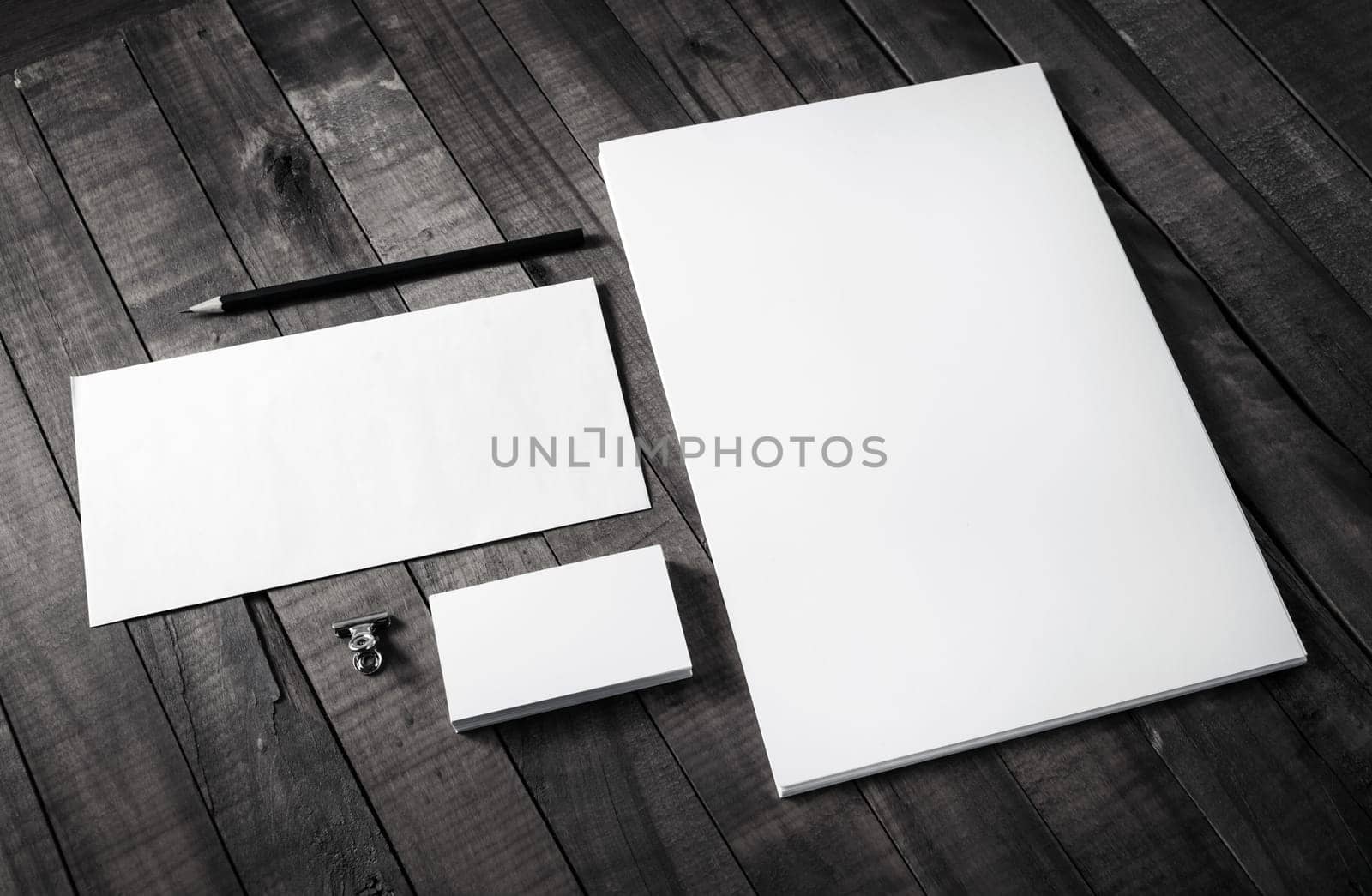 Photo of blank stationery on wood background. Corporate identity set. Branding mockup. Responsive design template.