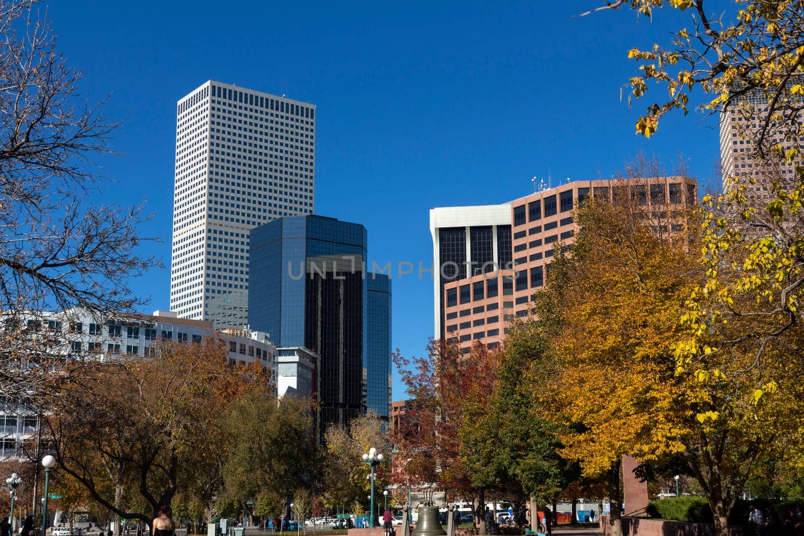 View from the city park on downtown Denver and blue sky on a clear sunny day.