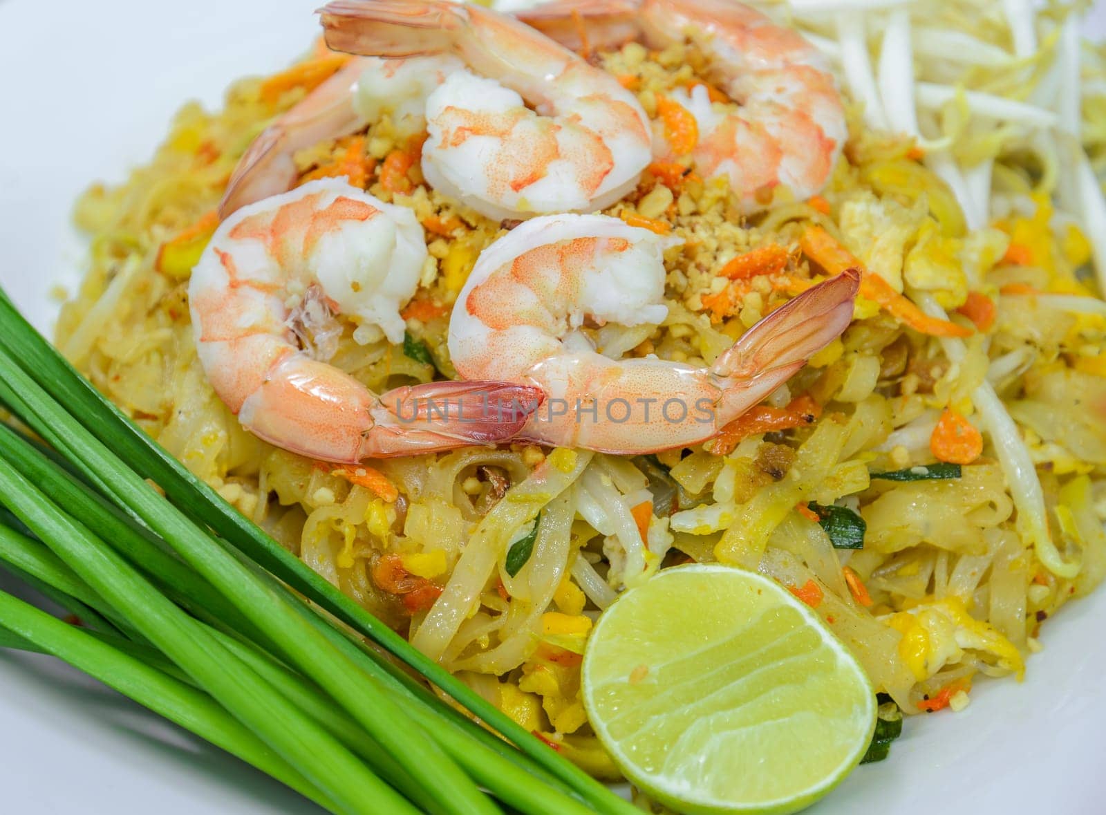 Pad Thai, Stir-fried rice noodle with egg, tofu and shrimp. Famous Thai street food in Thailand