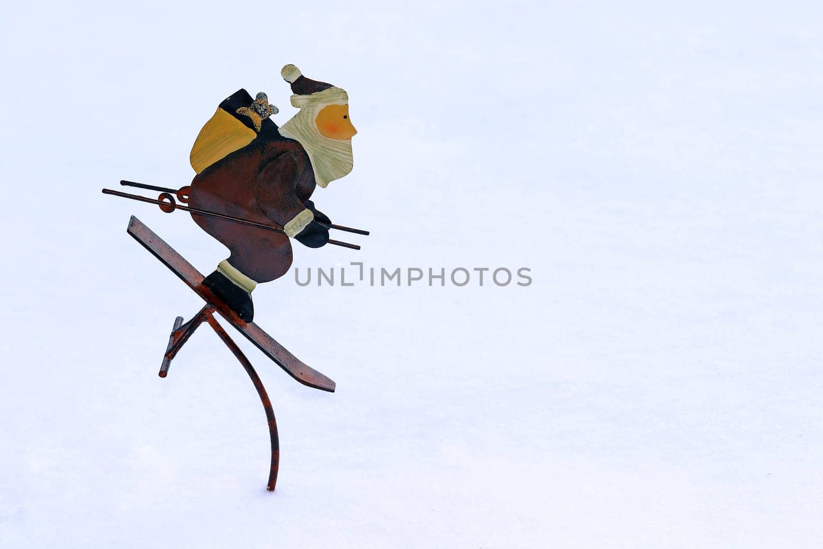 Winter decoration - A skier St. Nicholas in the snow