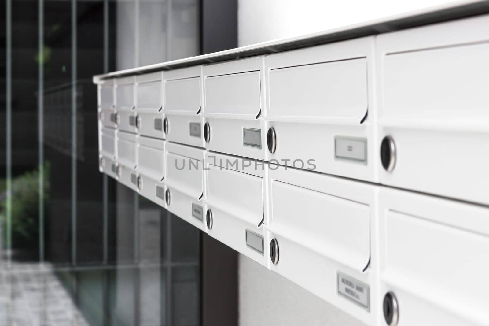 Mailboxes and lock in rows at entrance. Shallow DOF.