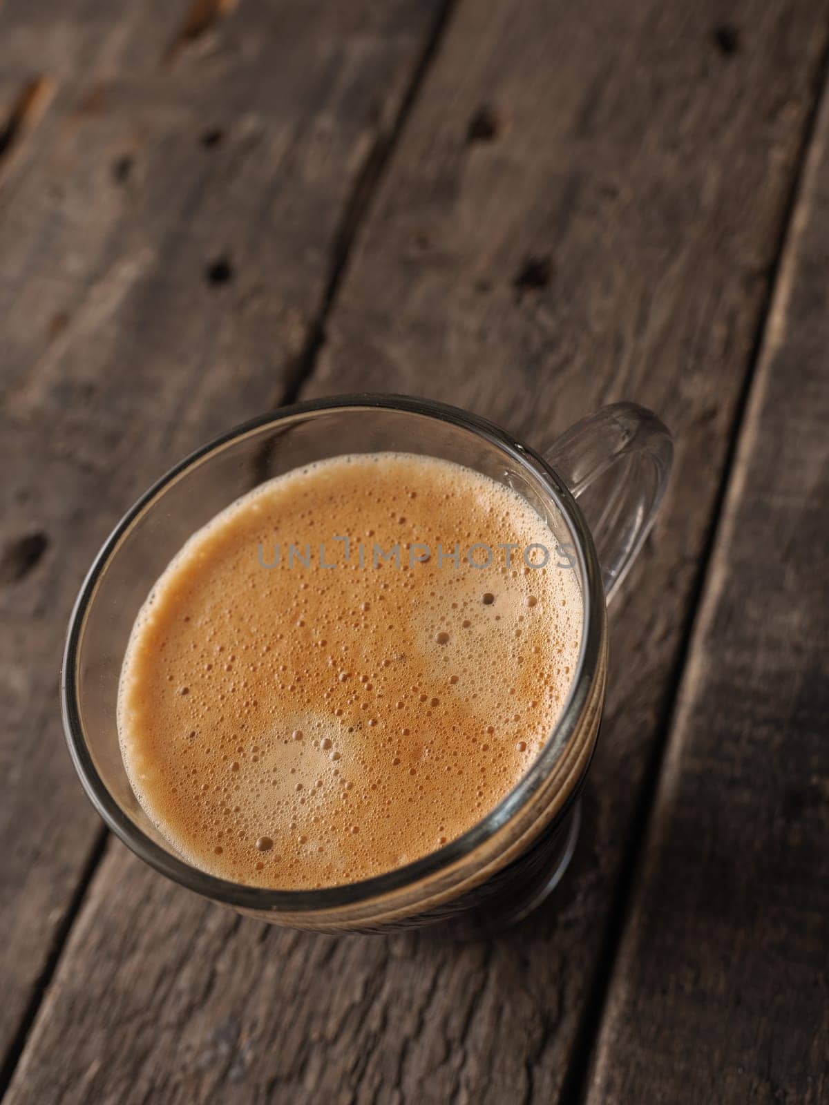 Delicious coffee on a rustic wooden table
