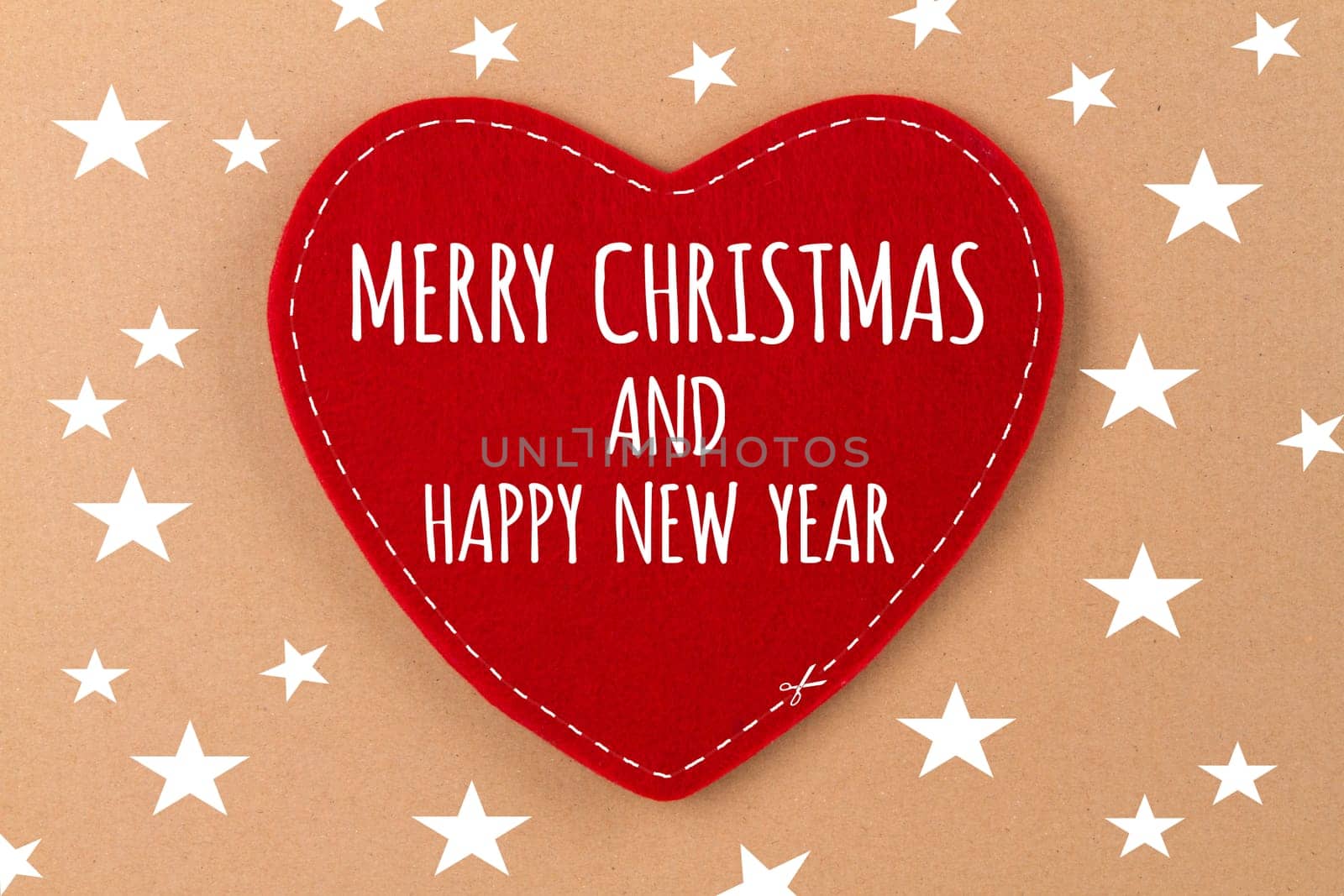 Heart on beige background with lettering - Merry Christmas