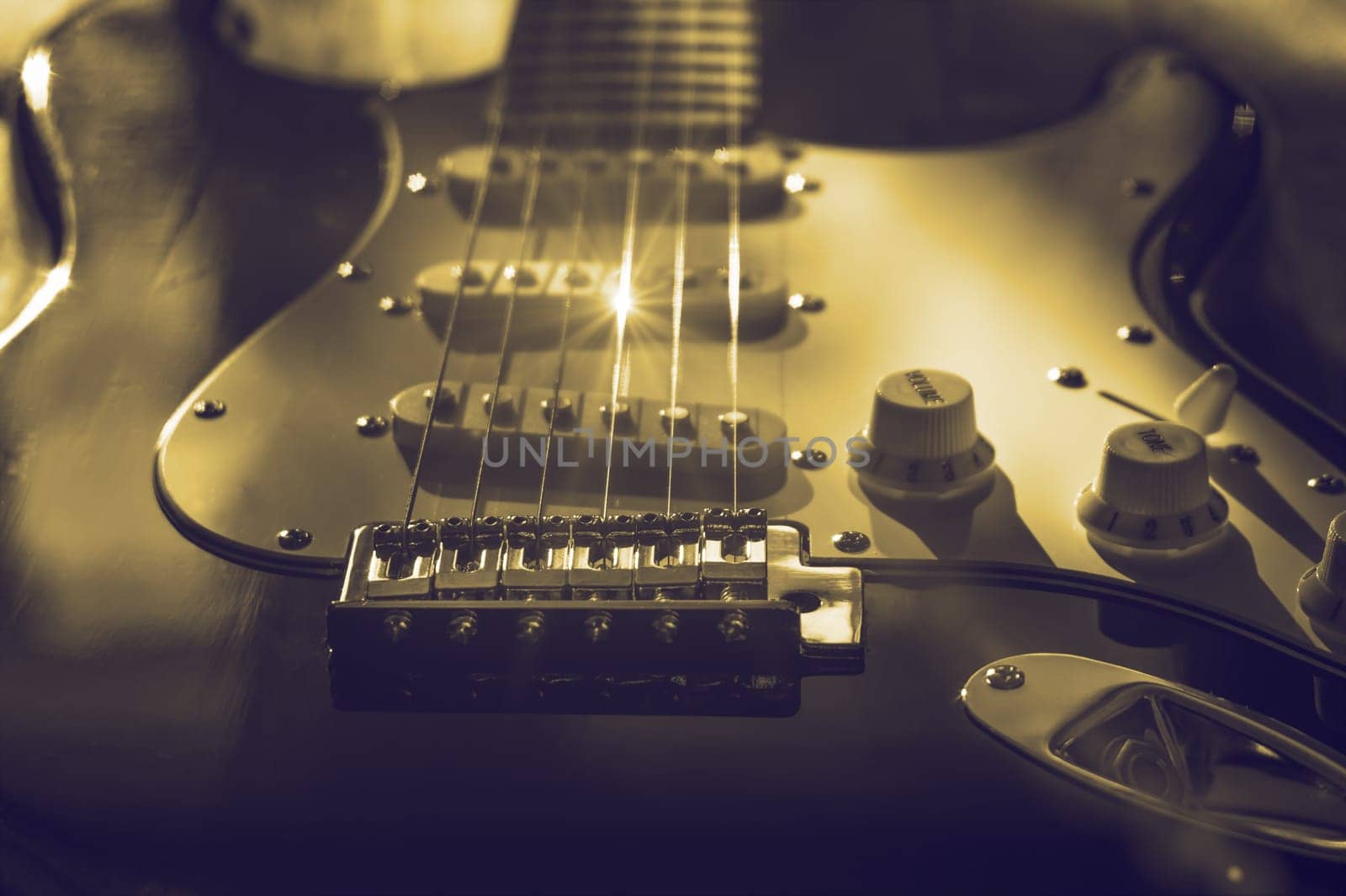 Vintage guitar stratakaster system close up. Yellow blue toning.
