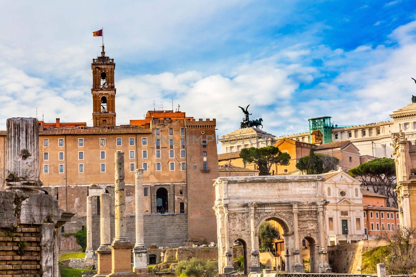 Roman Forum Septemus Severus Arch Capatoline Hill ColumnsRome Italy.  Forum rebuilt by Julius Ceasar in 46 BC