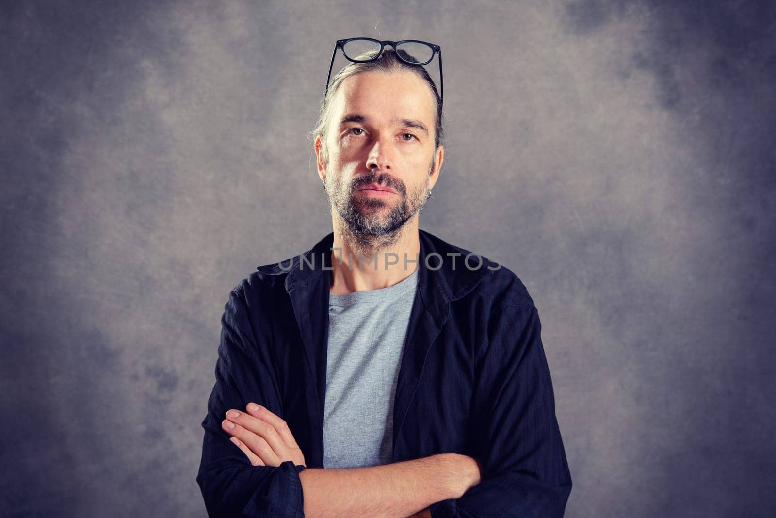 young man looking serious in to the camera