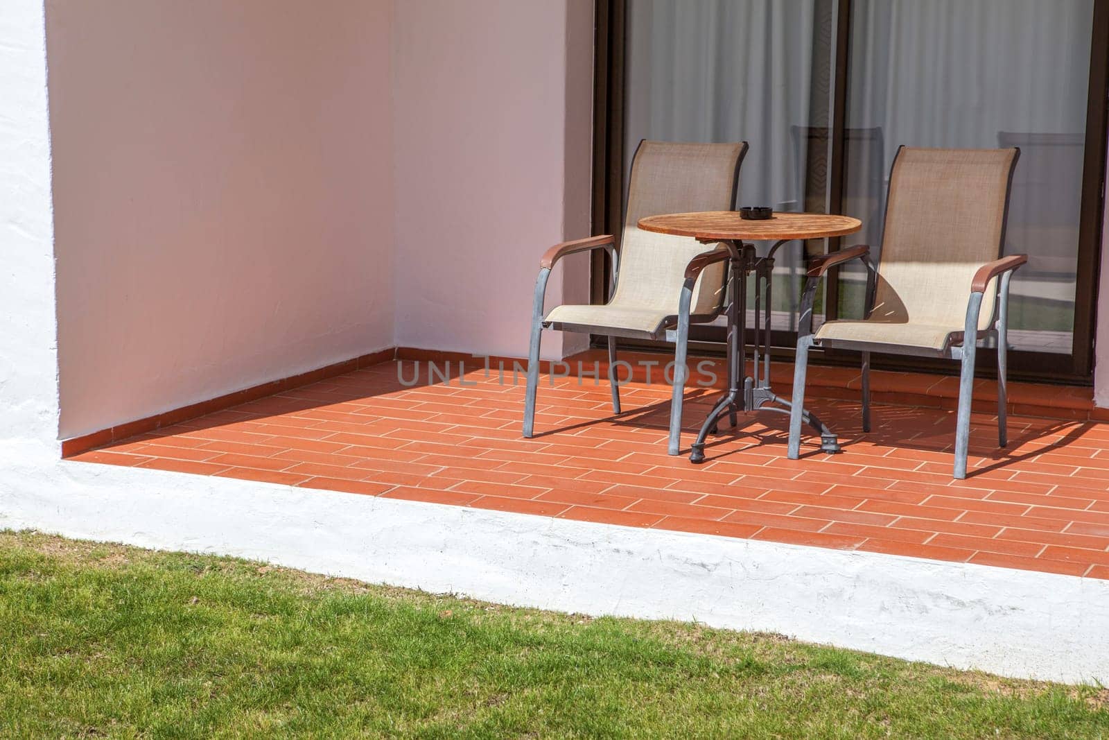 Open terrace to garden at holidays apartment resort, Andalusia, Spain