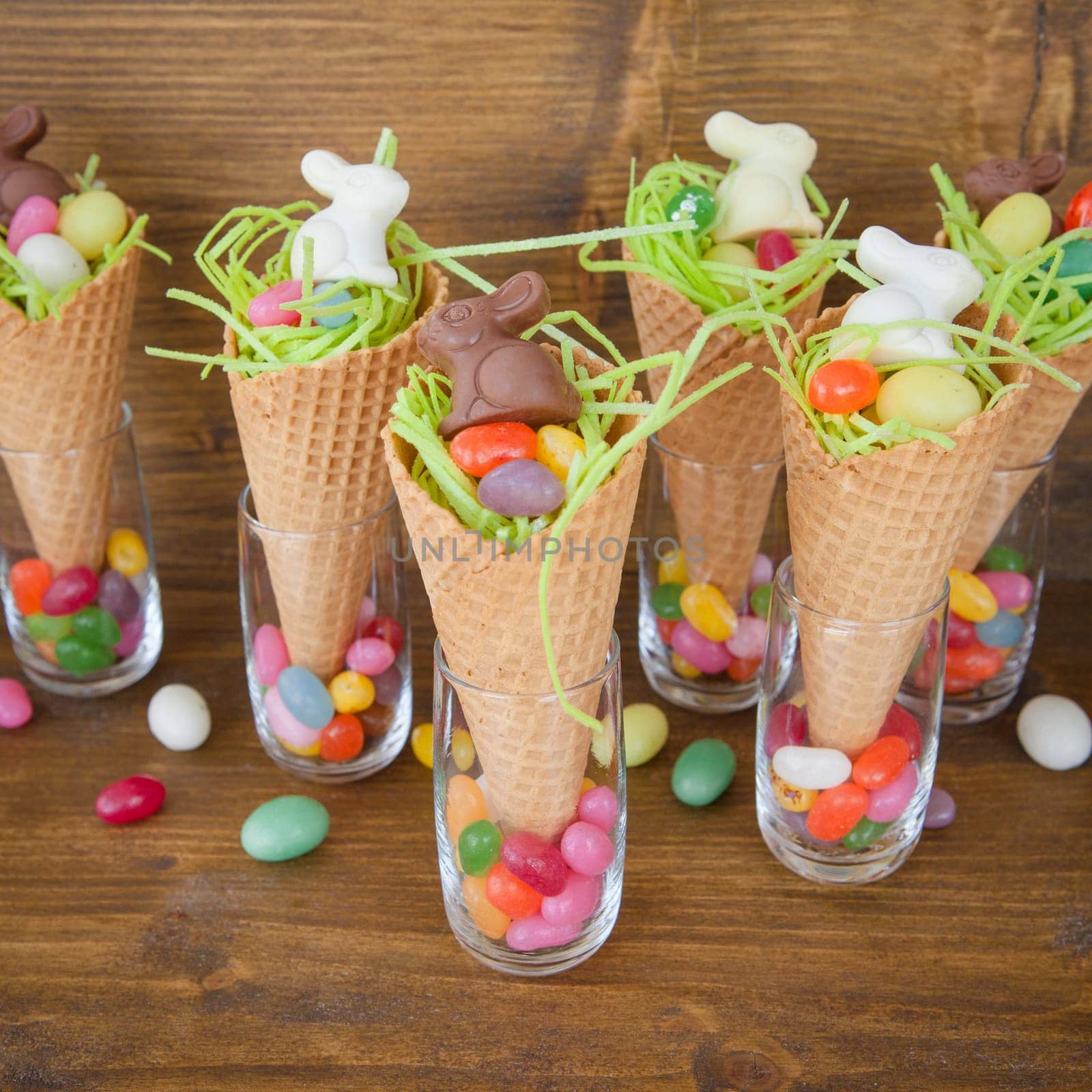 Small colorful Easter nests in waffle daes