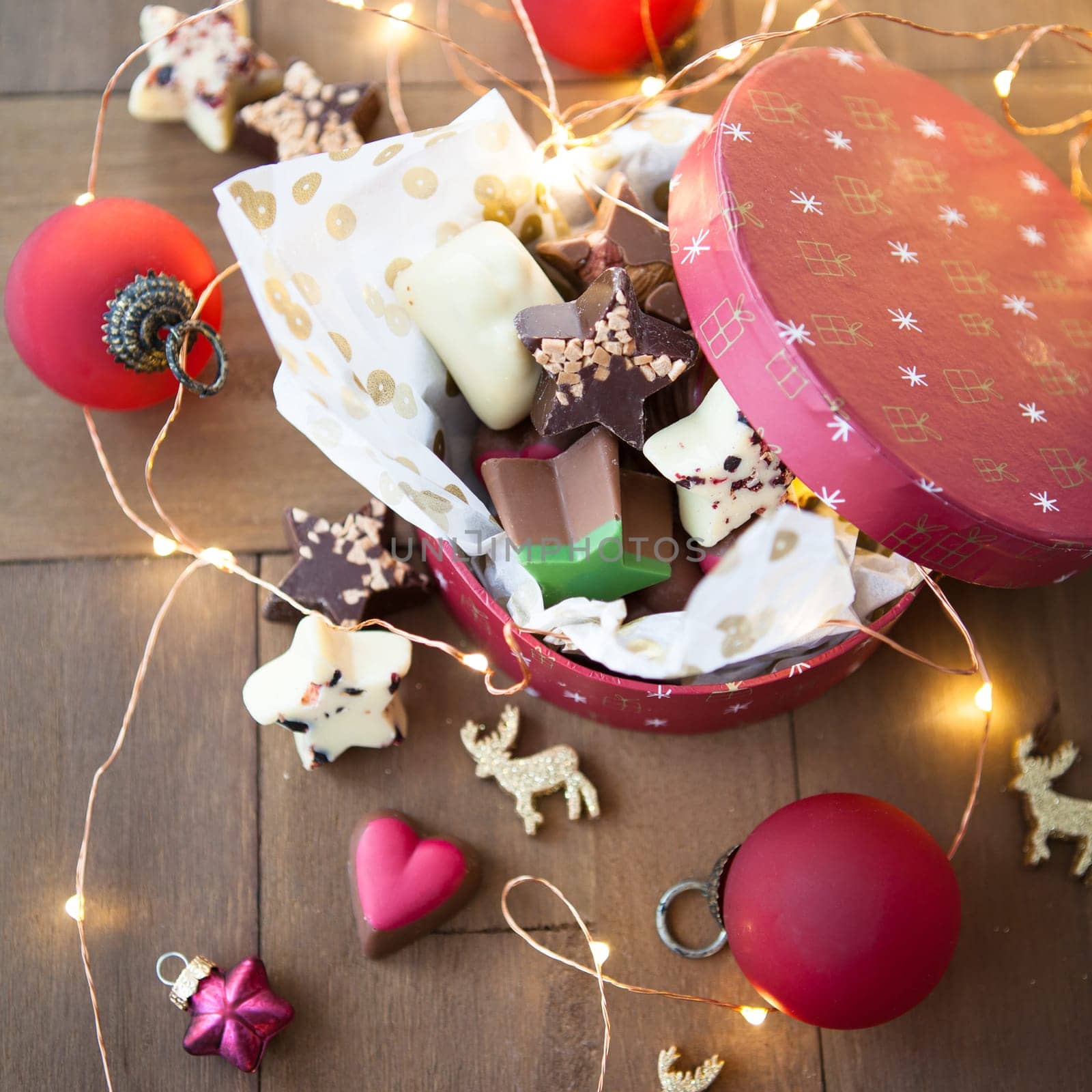 Small box with colorful chocolates for Christmas