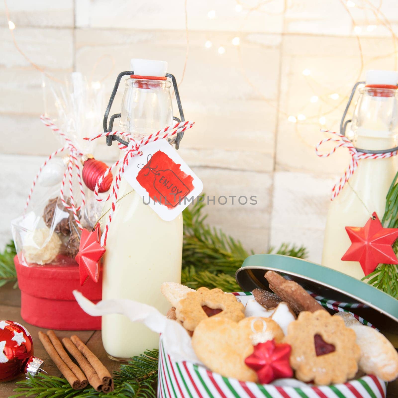 Bottle of egg punch with colorful decoration for Christmas