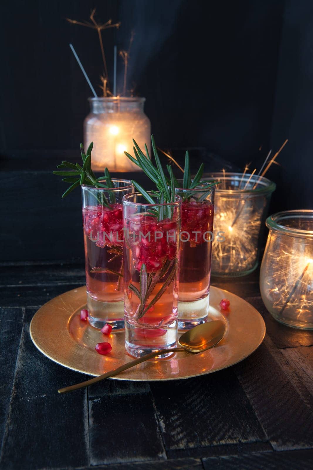 Festive drink with rosemary and pomegranate