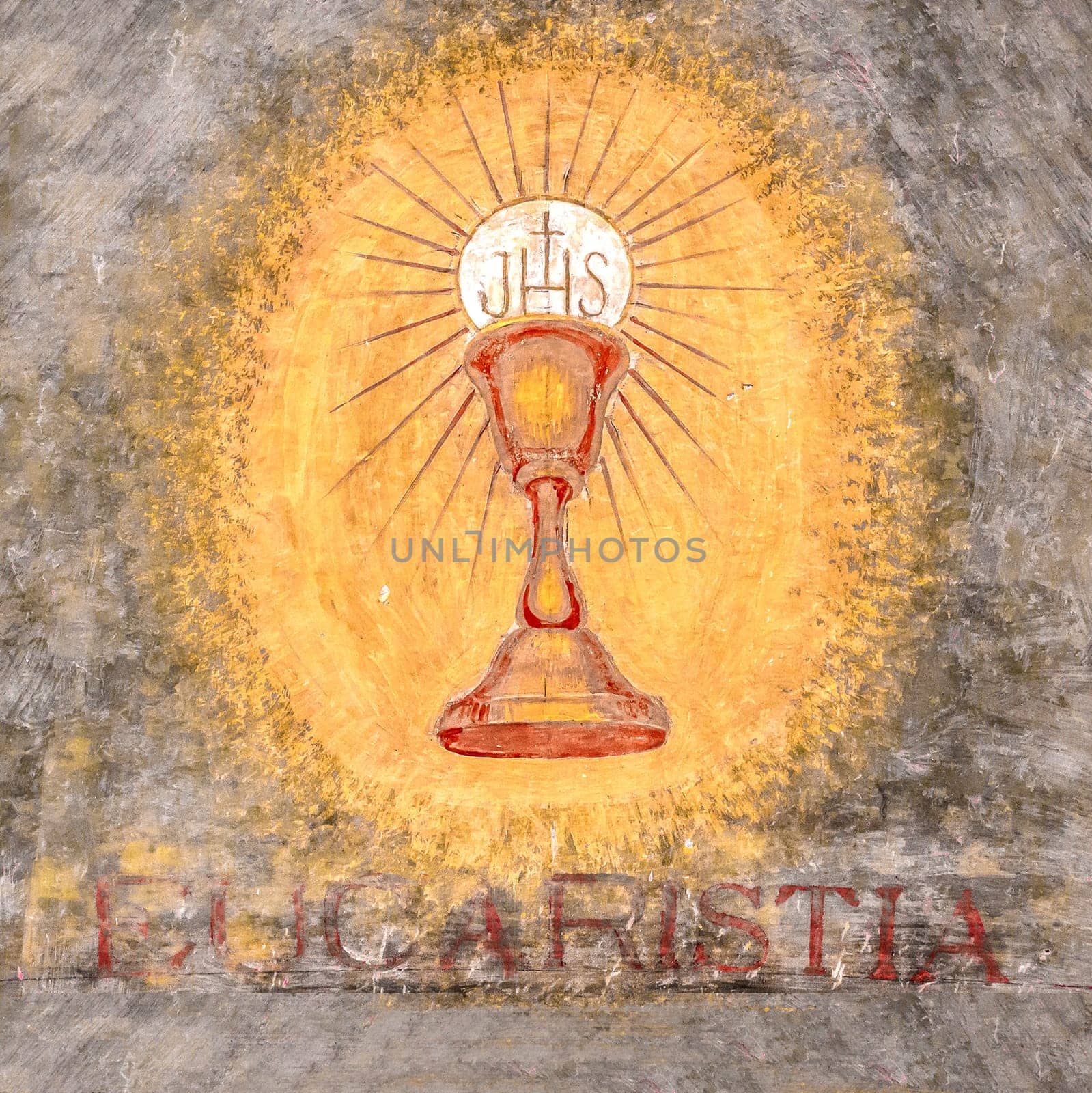 Fresco depicting the sacred chalice of Jesus. "Eucaristia"" in Italian means: Eucharist, Holy Communion, Communion."