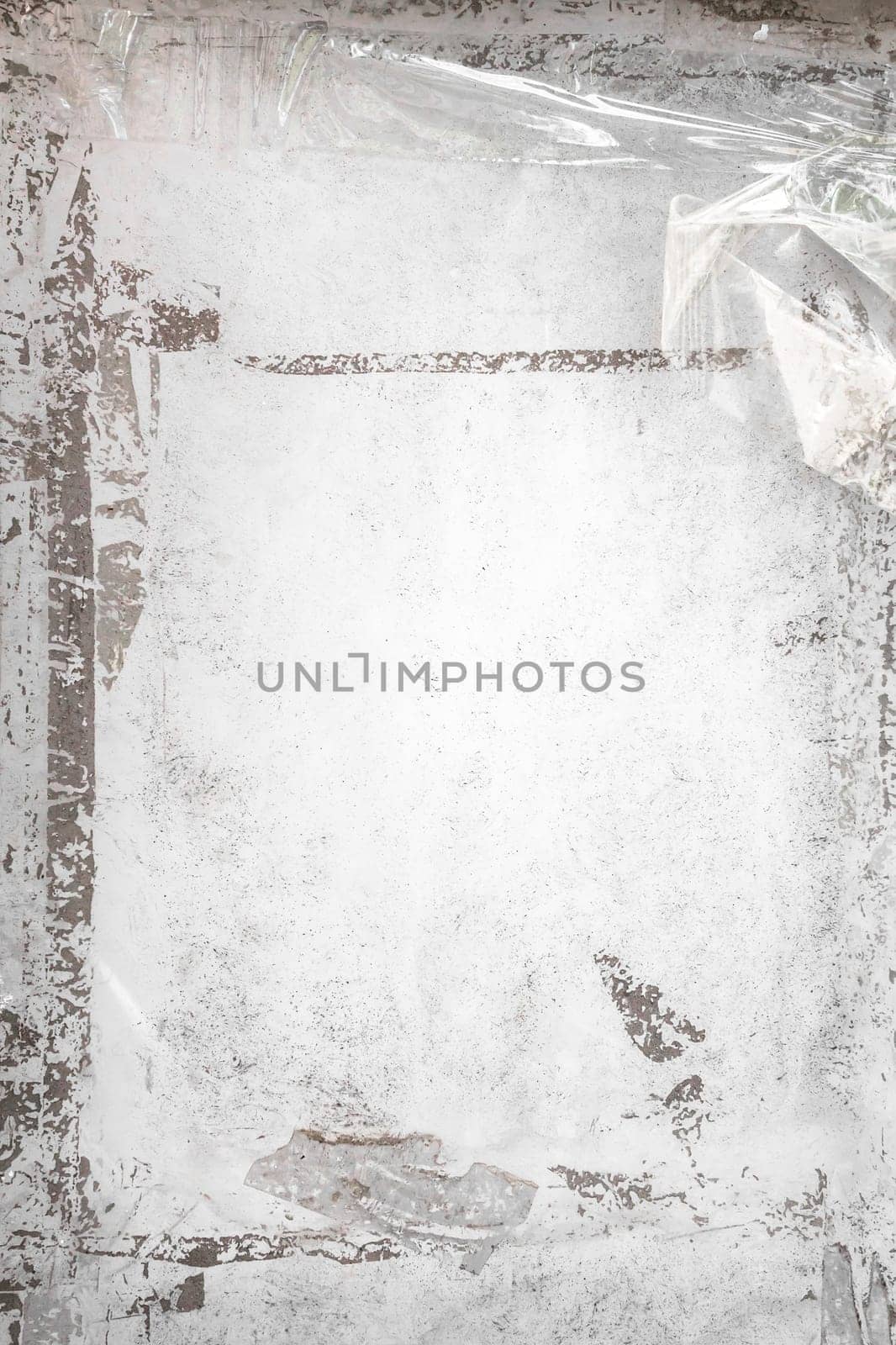 Grungy frame with remains of scotch tape and cellophane. Vertical background fully editable. It can be used as a poster, wallpaper, design t-shirts and more.